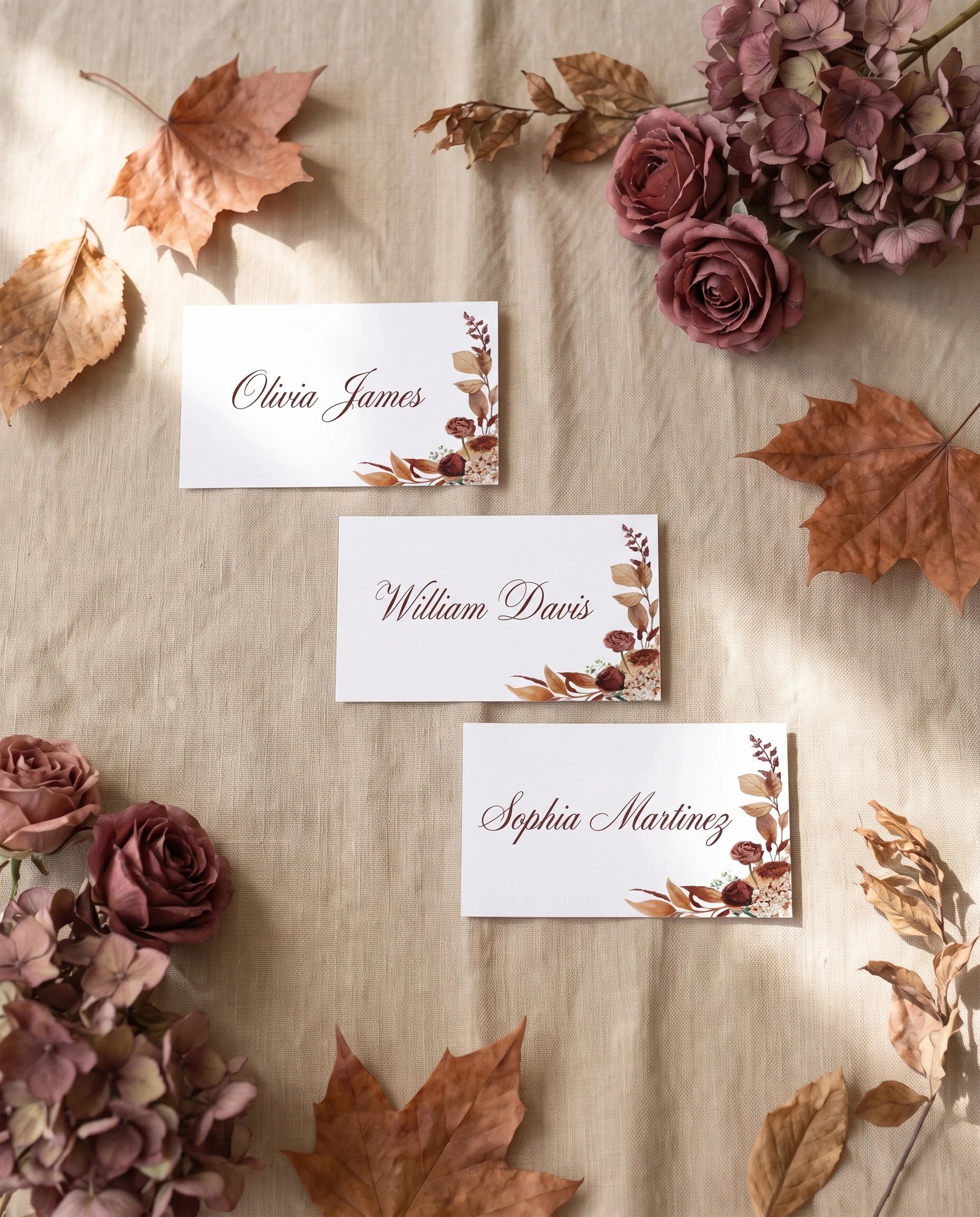 Bramble Row wedding place cards — several place cards shown flat on premium editorial paper under soft natural light, wedding place cards.