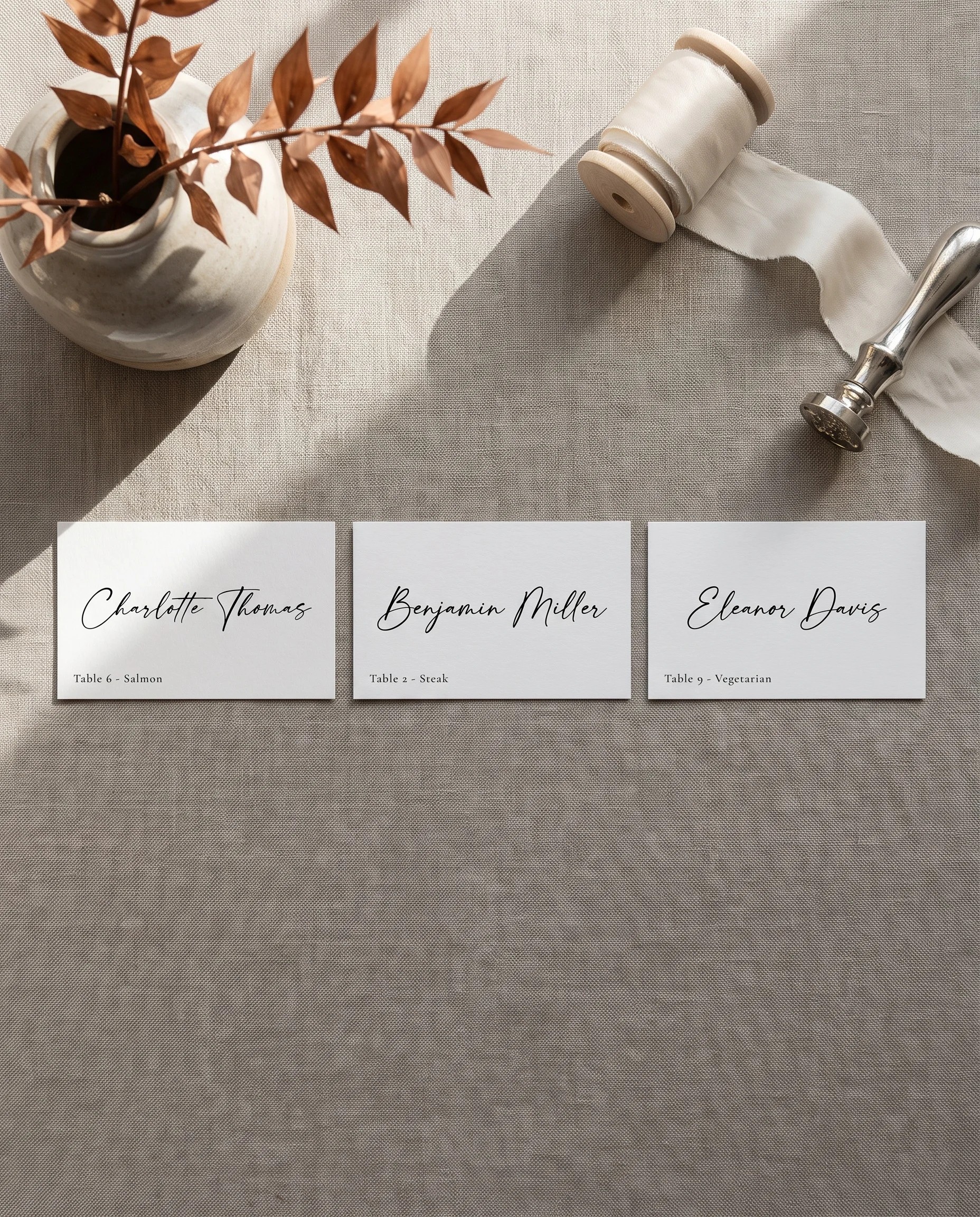 Tonal Reply wedding place cards — several place cards shown flat under soft natural light, wedding place cards