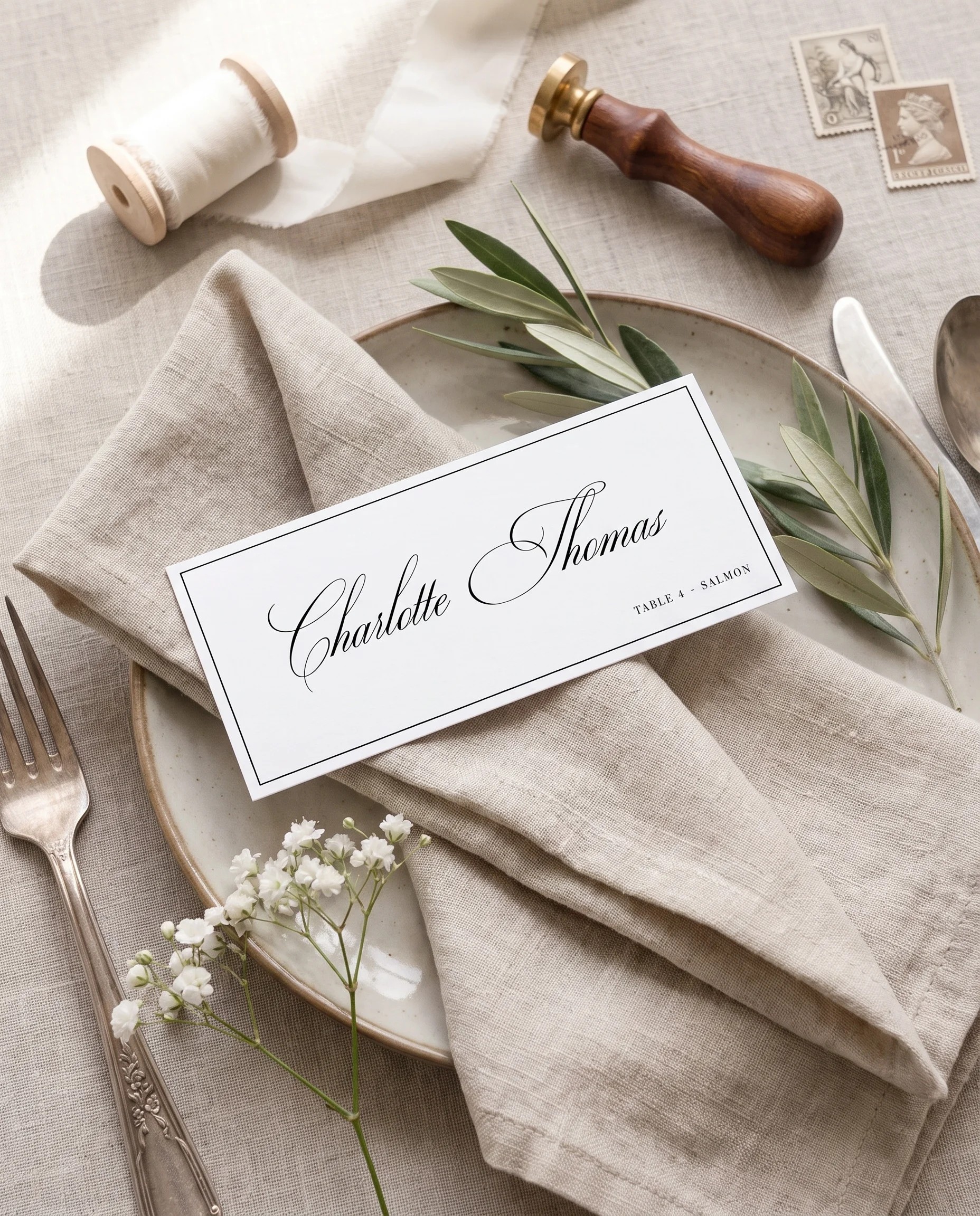 Crestline wedding place cards — a single card displayed at a set place setting under soft natural light, wedding name cards.