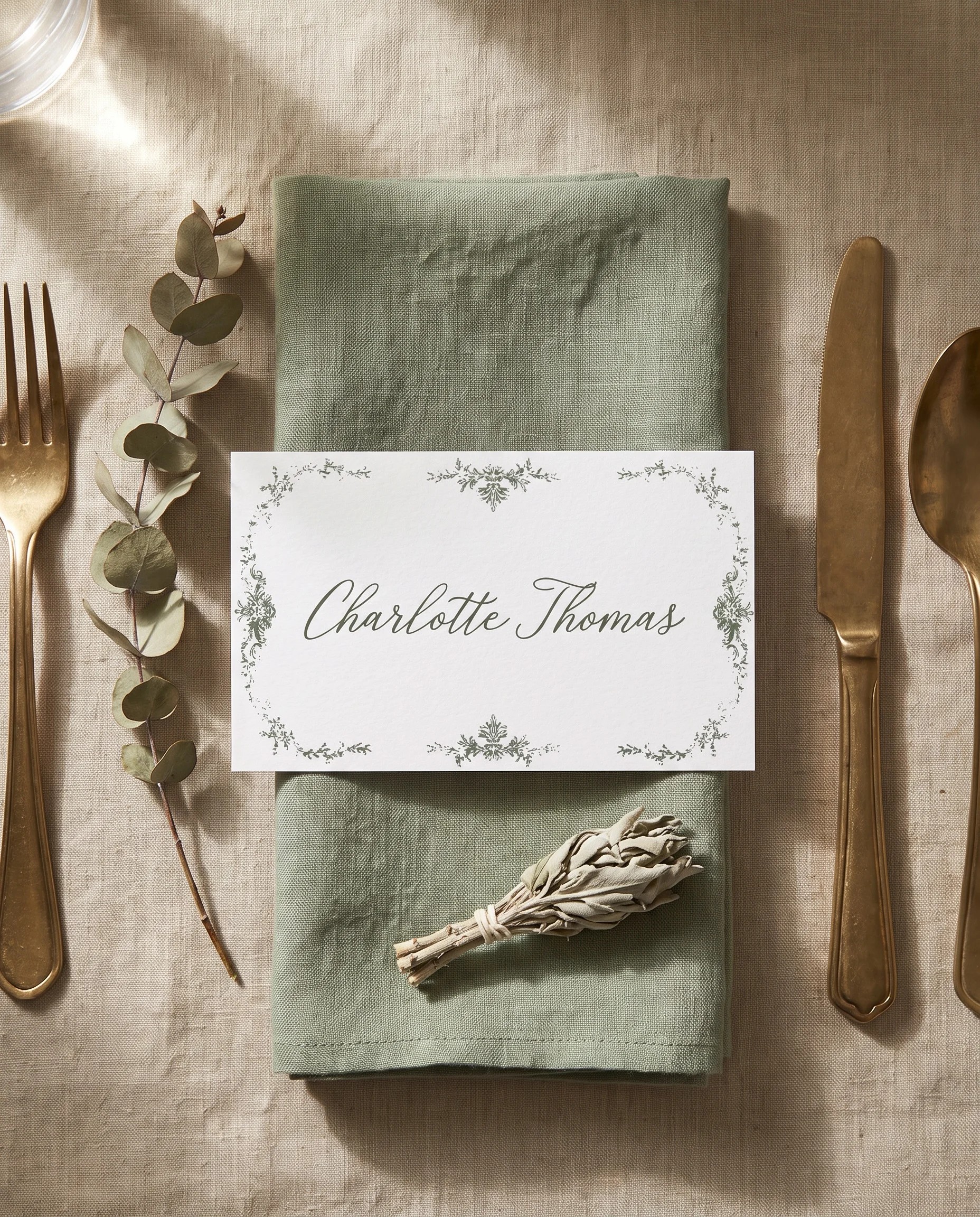Sage Crest wedding place cards — single card displayed at a table setting under soft natural light, wedding name cards.