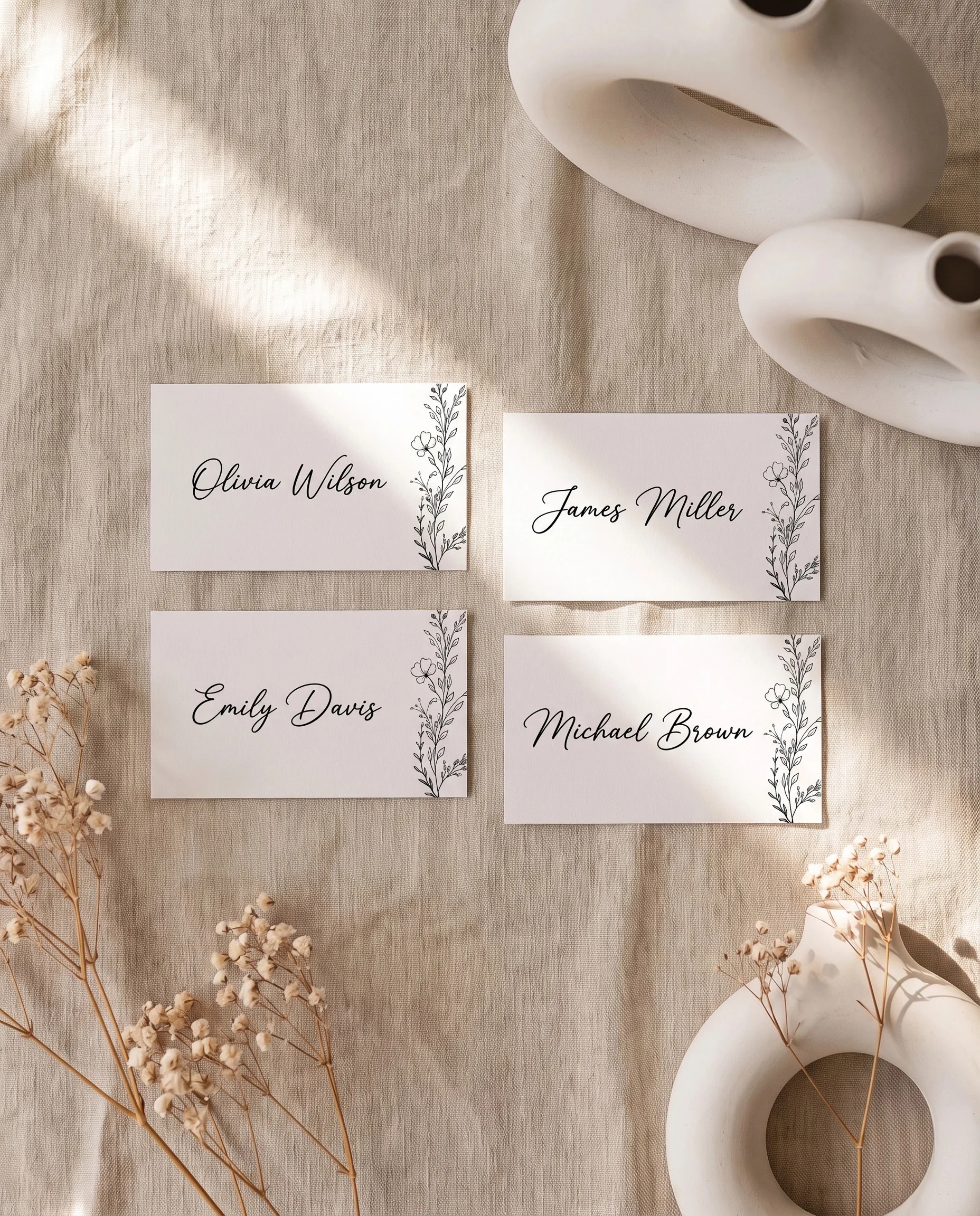Meadow Sprig wedding place cards — several place cards shown flat under soft natural light, wedding place cards.