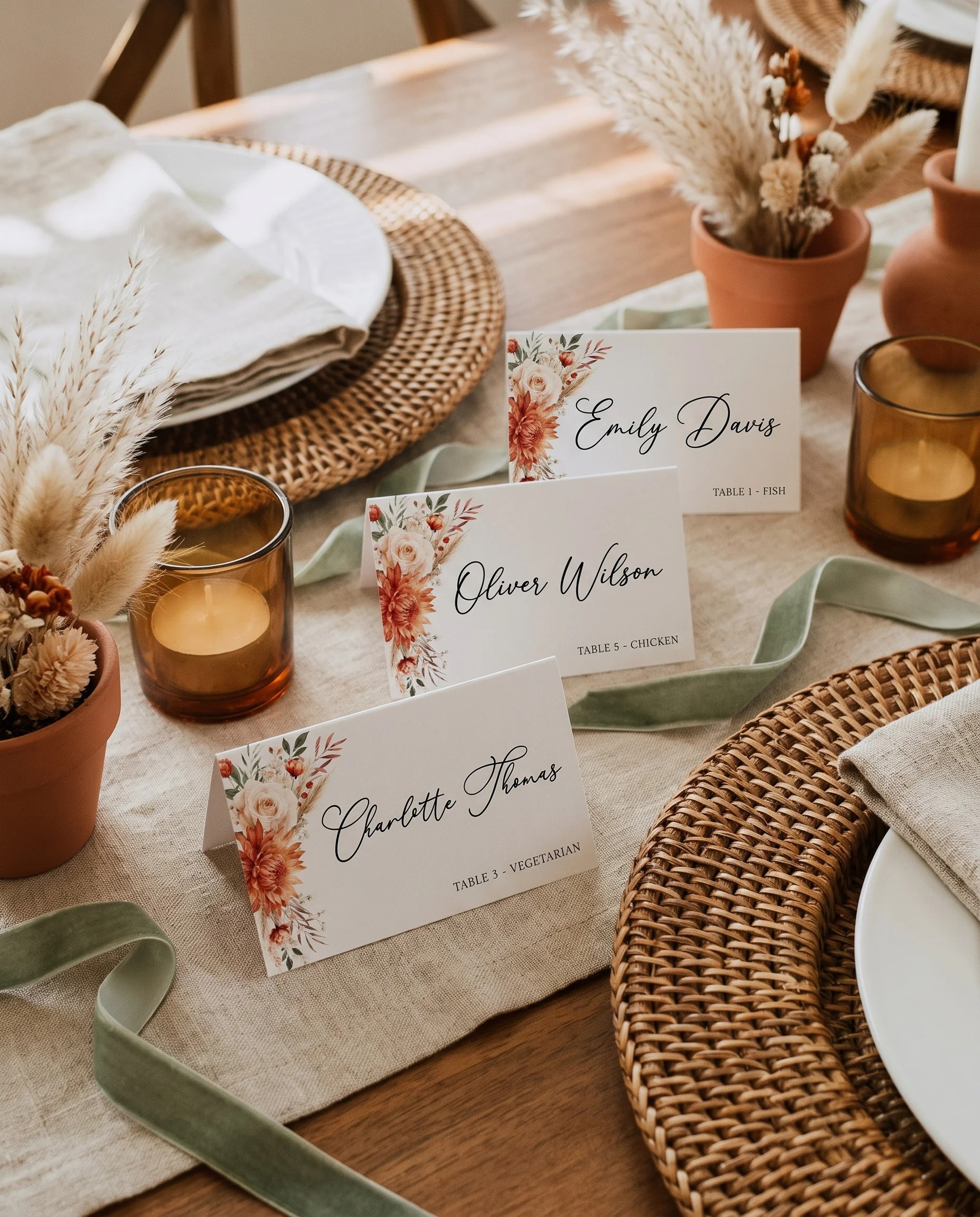 Marigold wedding place cards — several place cards arranged on a dressed reception table under soft natural light, place card template.