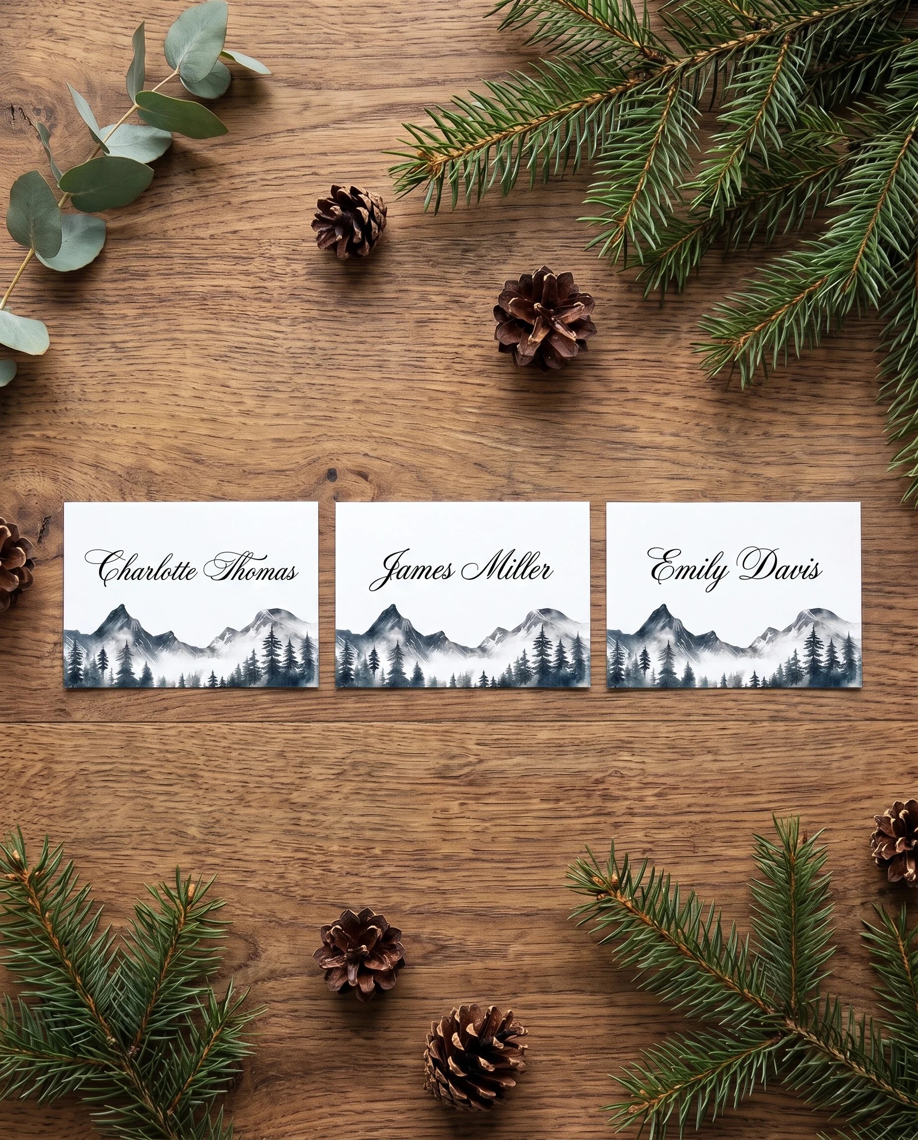 Pinecrest wedding place cards — several place cards shown flat under soft natural light, slight overhead angle, wedding place cards