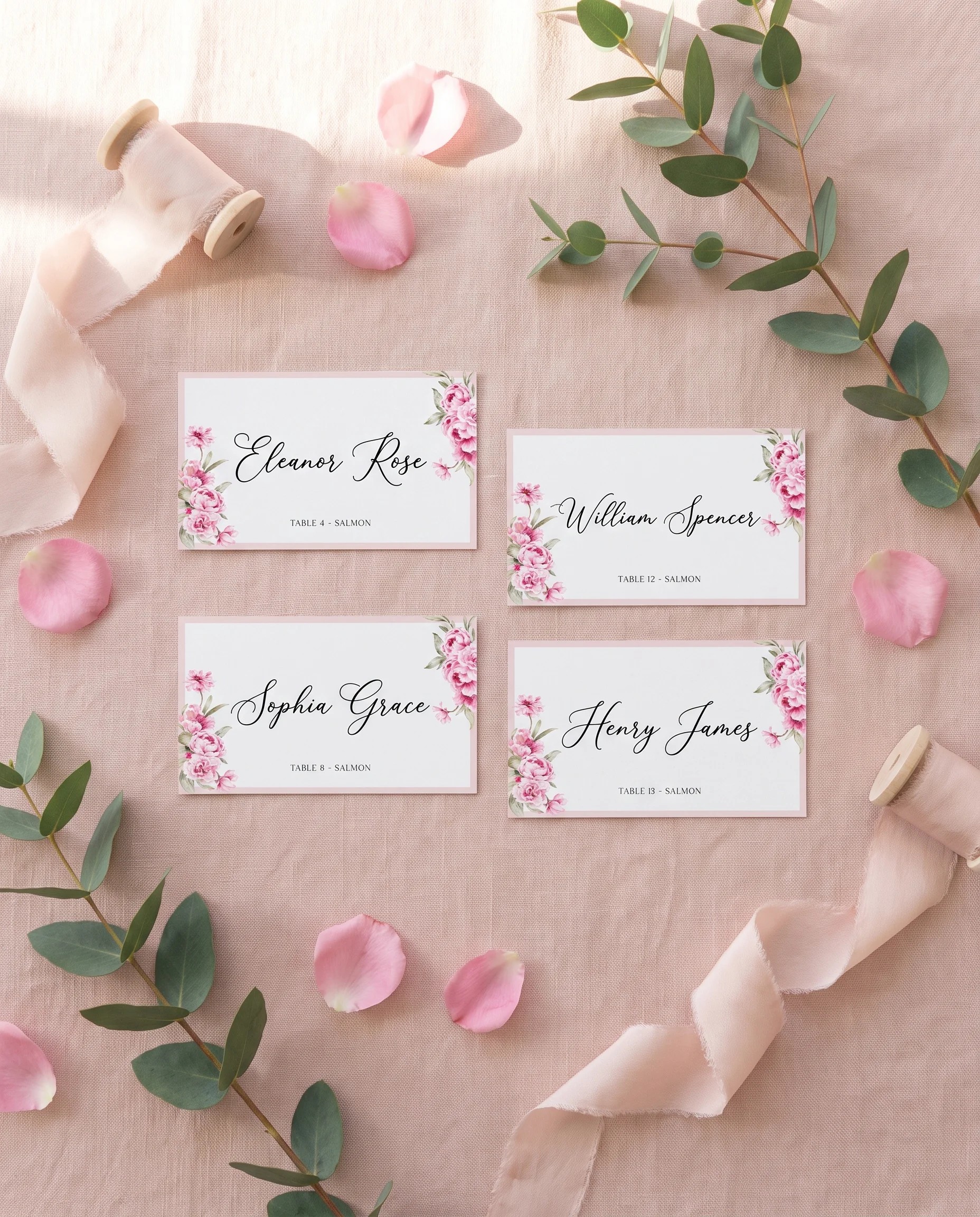 Blush Peony wedding place cards — several place cards shown flat under soft natural light on premium editorial paper, wedding place cards.
