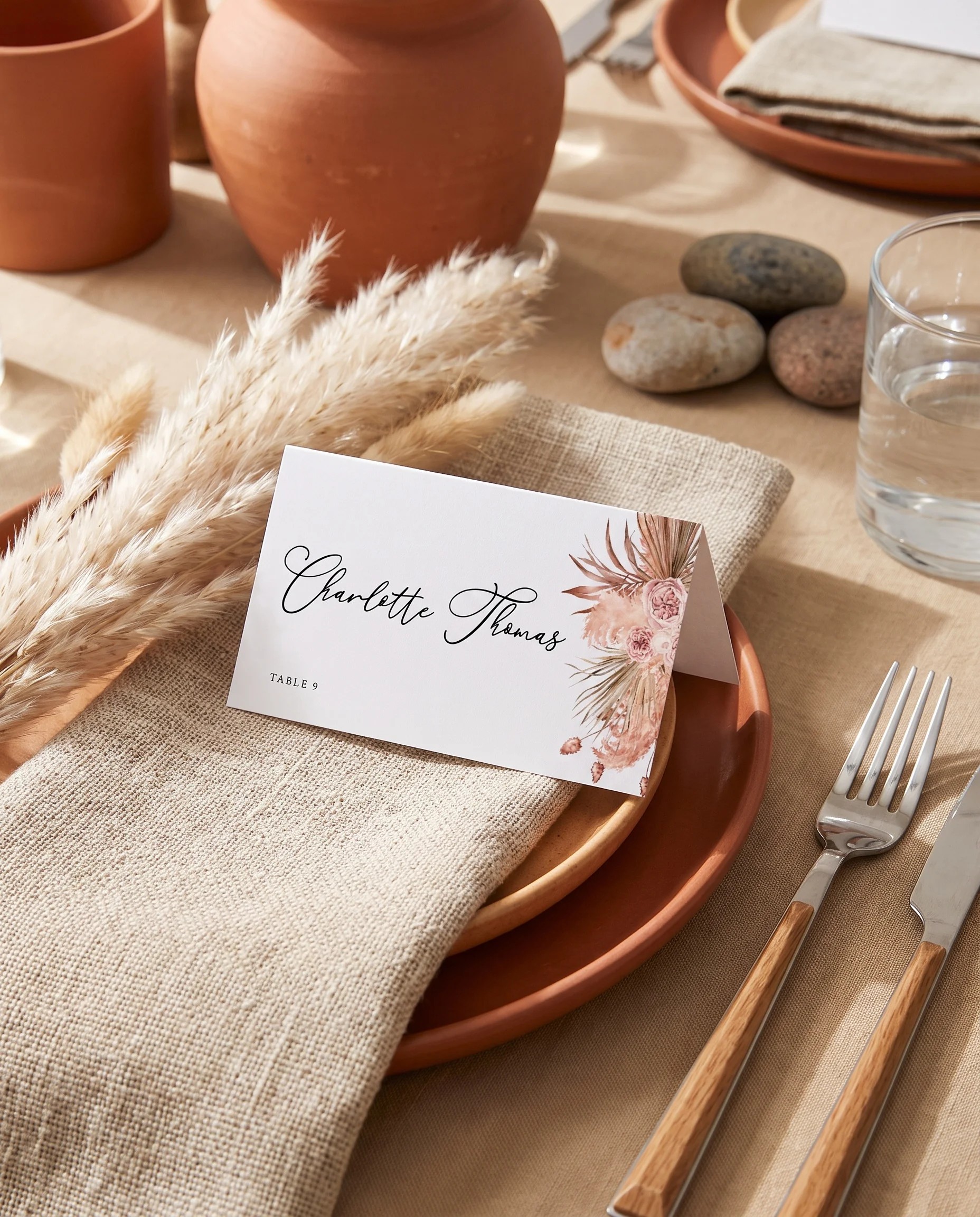 Desert Bloom wedding place cards — single card displayed at a set place setting under soft natural light, wedding name cards.