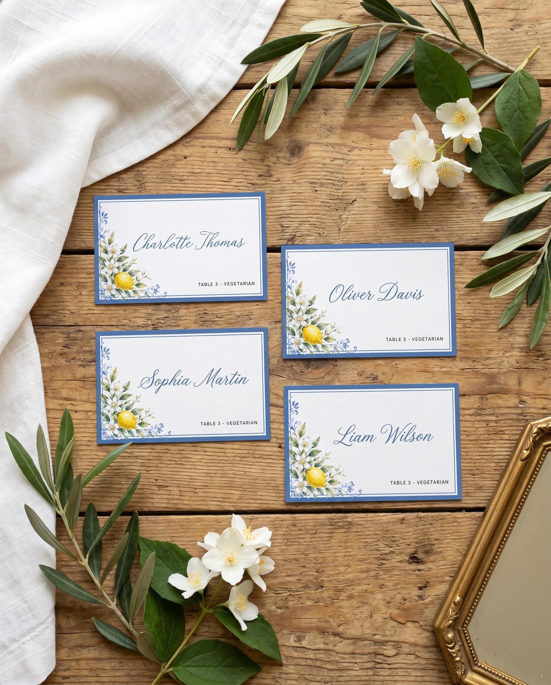 Amalfi Grove wedding place cards — several place cards shown flat under soft natural light at a slight overhead angle, wedding place cards.