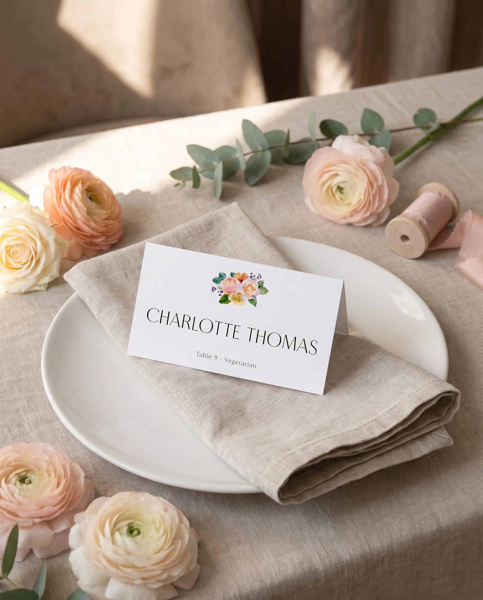 Petal Glade wedding place cards — a single card displayed at a set place setting under soft natural light, wedding name cards.
