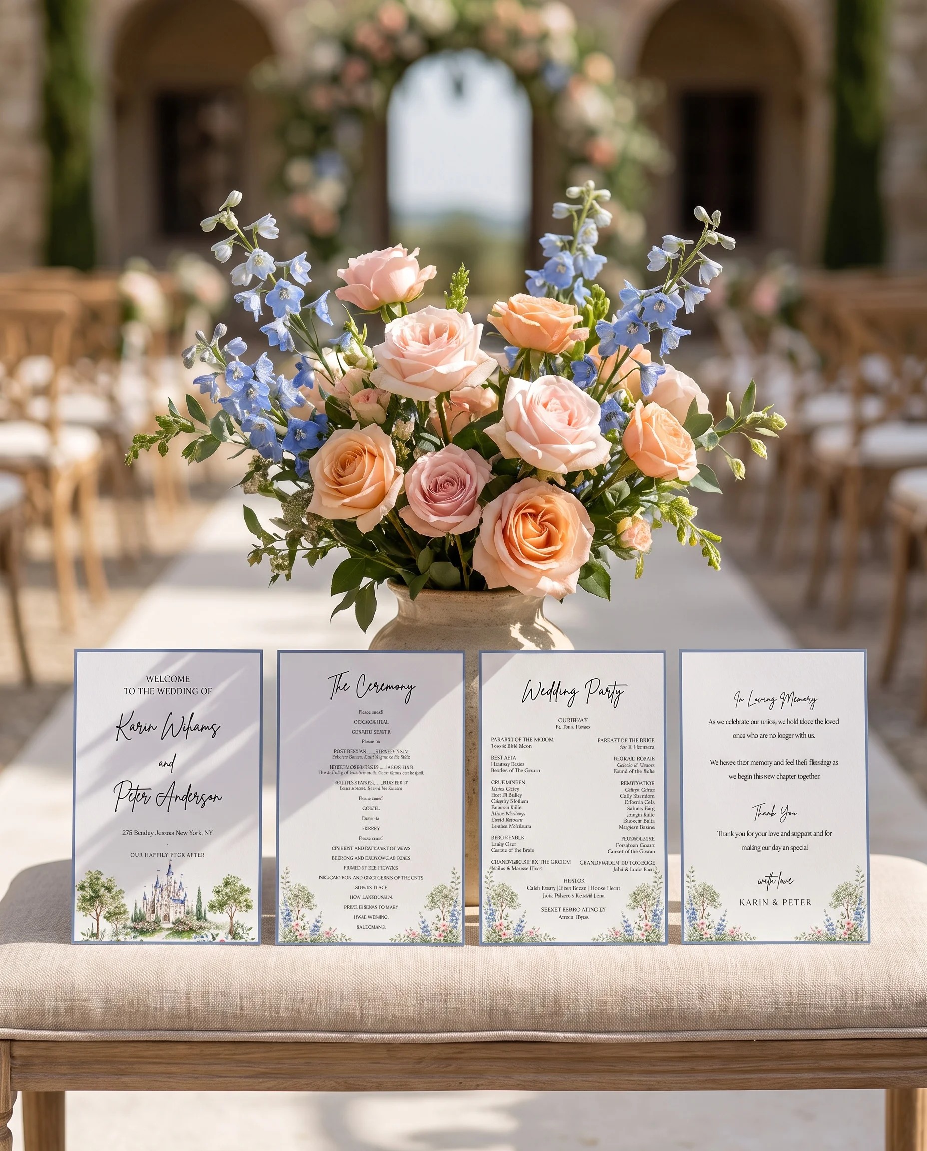Meadow Spire wedding program — four flat program cards standing upright at a ceremony under soft natural light, wedding program template.
