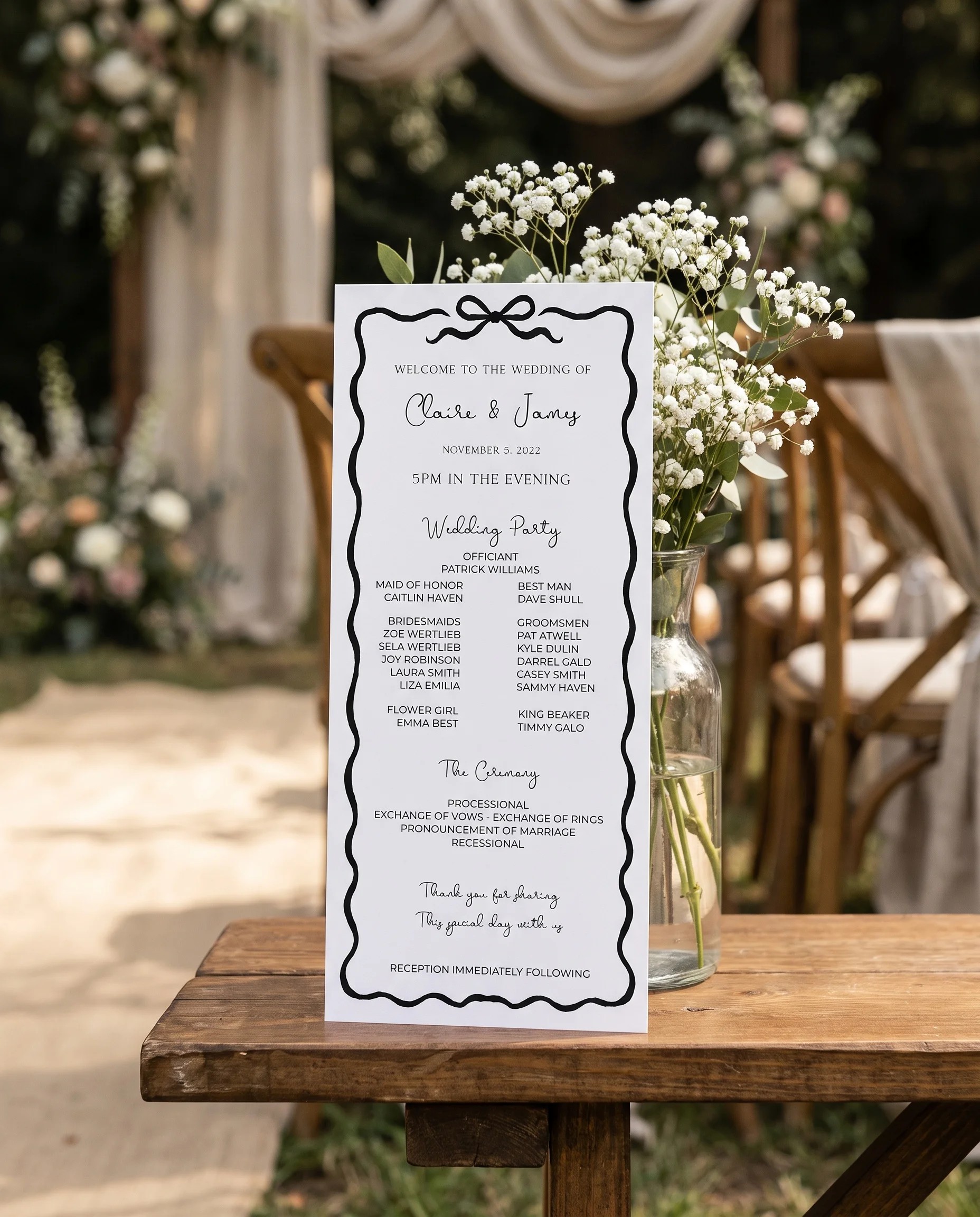 Sketchbook Bow wedding program — a flat card standing upright at the ceremony under soft natural light, wedding program template.