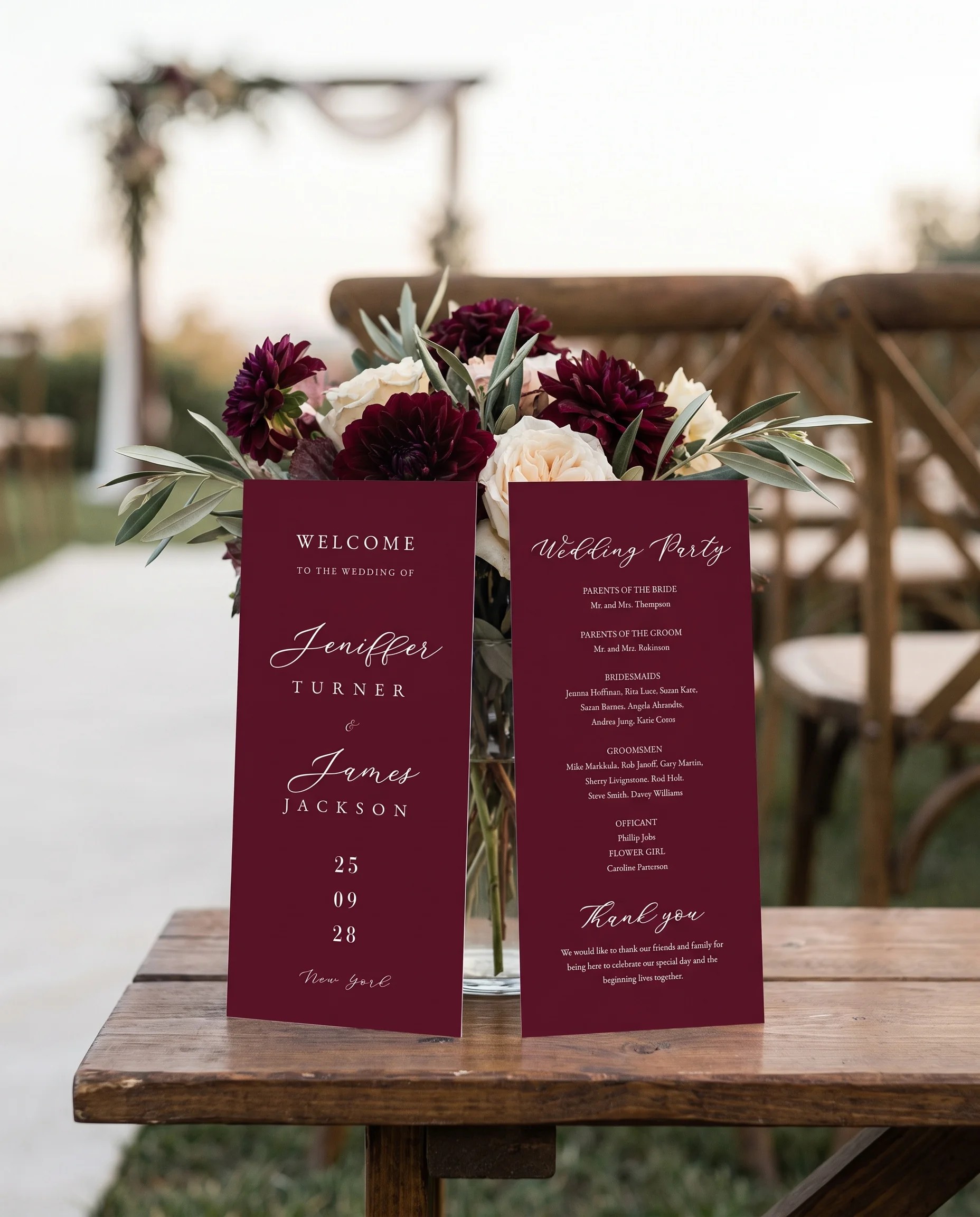 Claret Vine wedding program — two flat cards standing upright at a ceremony setting in soft natural light, wedding program template.