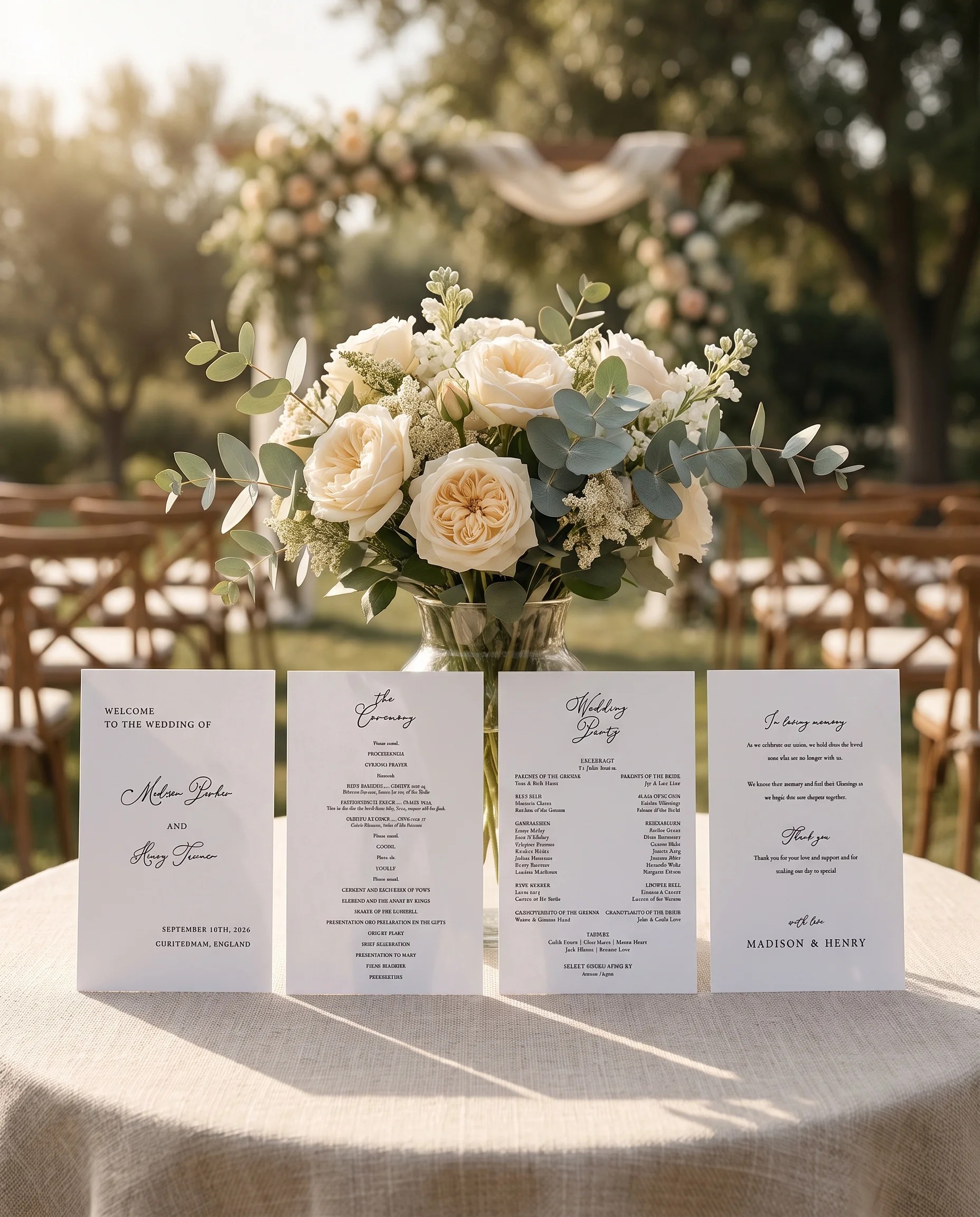 Quiet Line wedding program — four flat pages standing upright at a ceremony on premium paper under soft natural light, wedding program template.