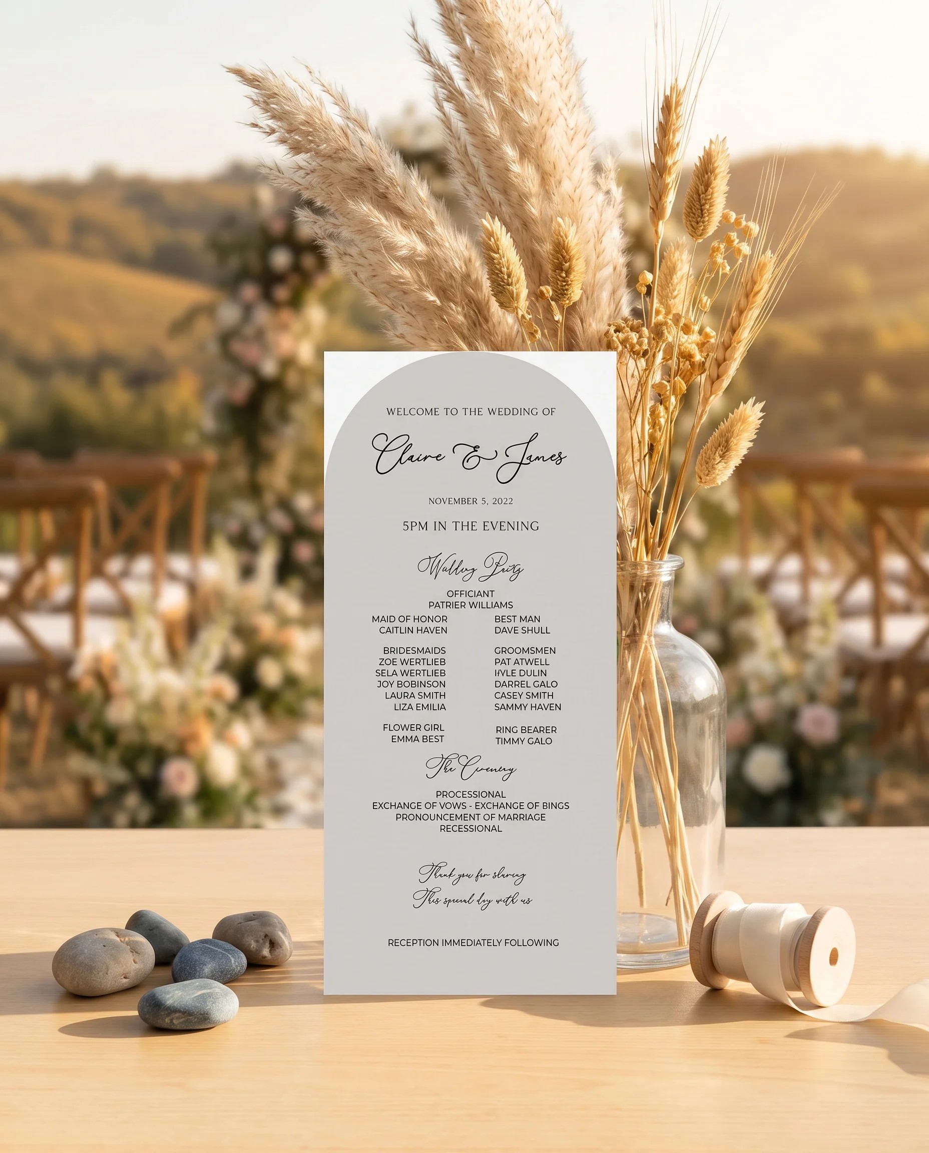 Halo Arch wedding program — flat card design standing upright at a ceremony under soft natural light, wedding program template.