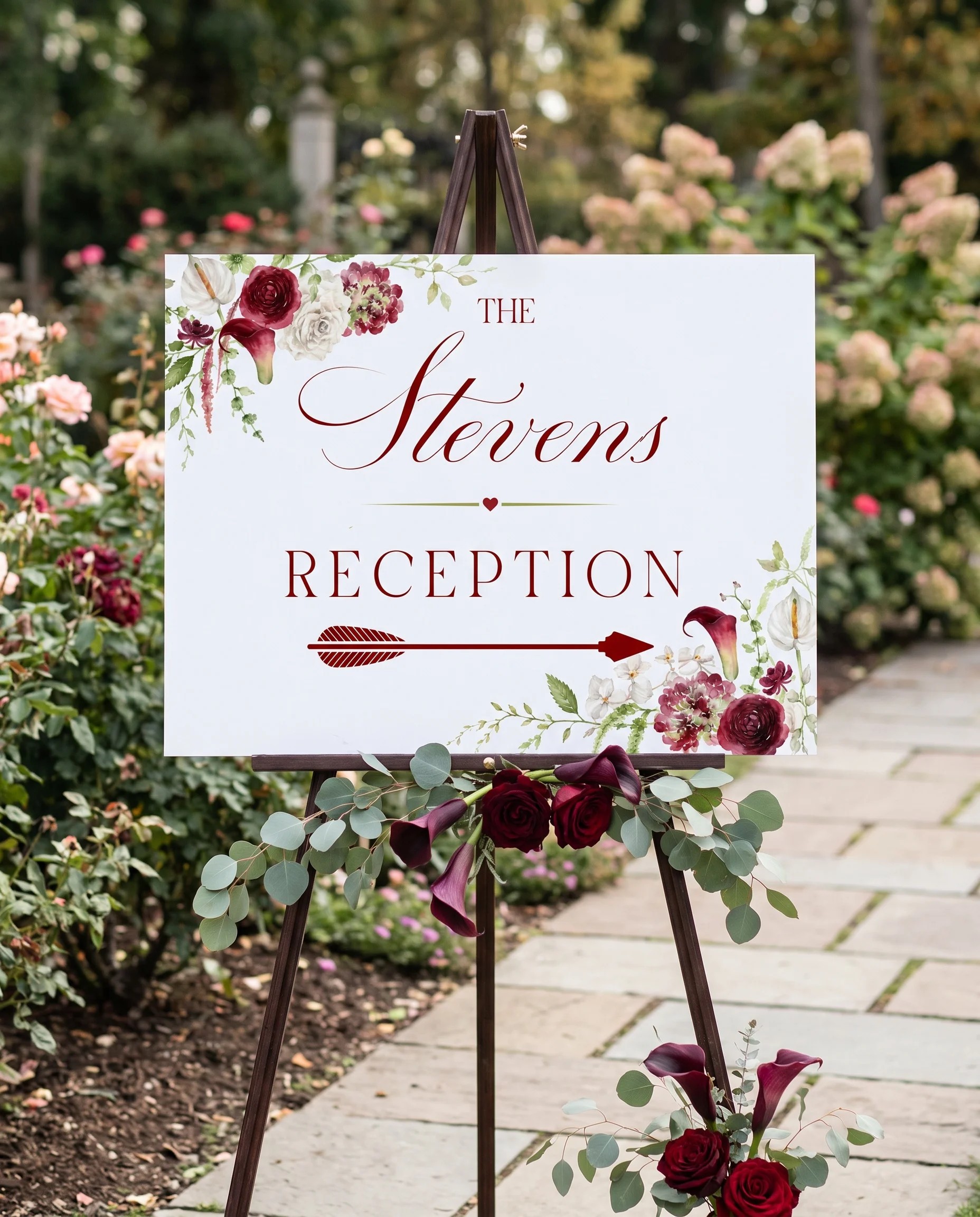 Burgundy Calla wedding reception sign — displayed at a reception entrance under soft natural light with a slight overhead angle, wedding signs