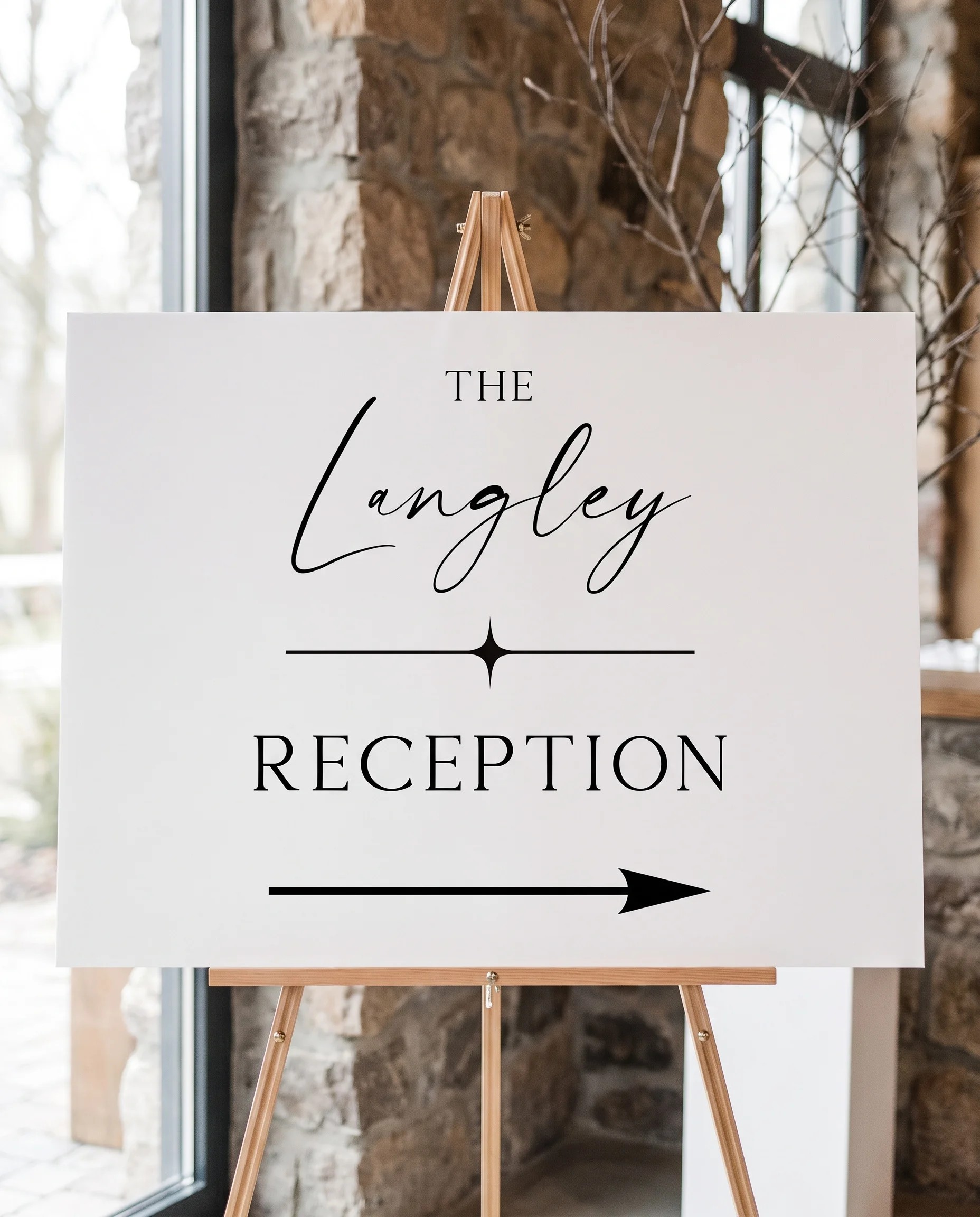 Liminal wedding reception sign — displayed on an easel under soft natural light with a slight overhead angle, wedding reception signs