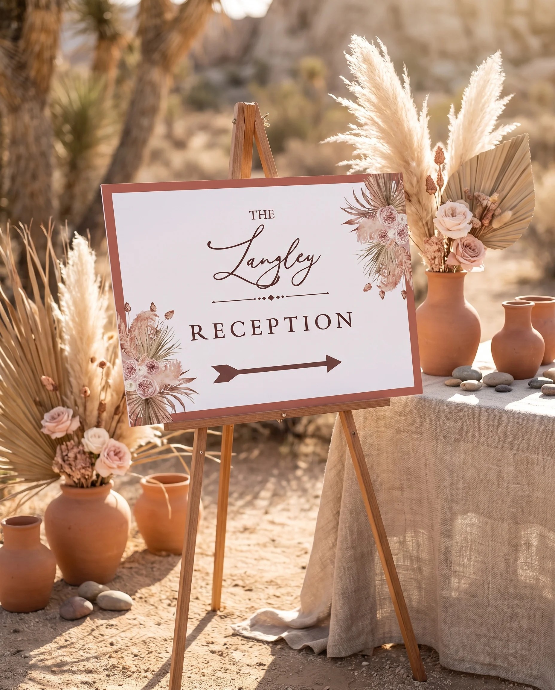 Desert Bloom wedding reception sign — displayed at a reception entrance under soft natural light with a slight overhead angle, wedding signs