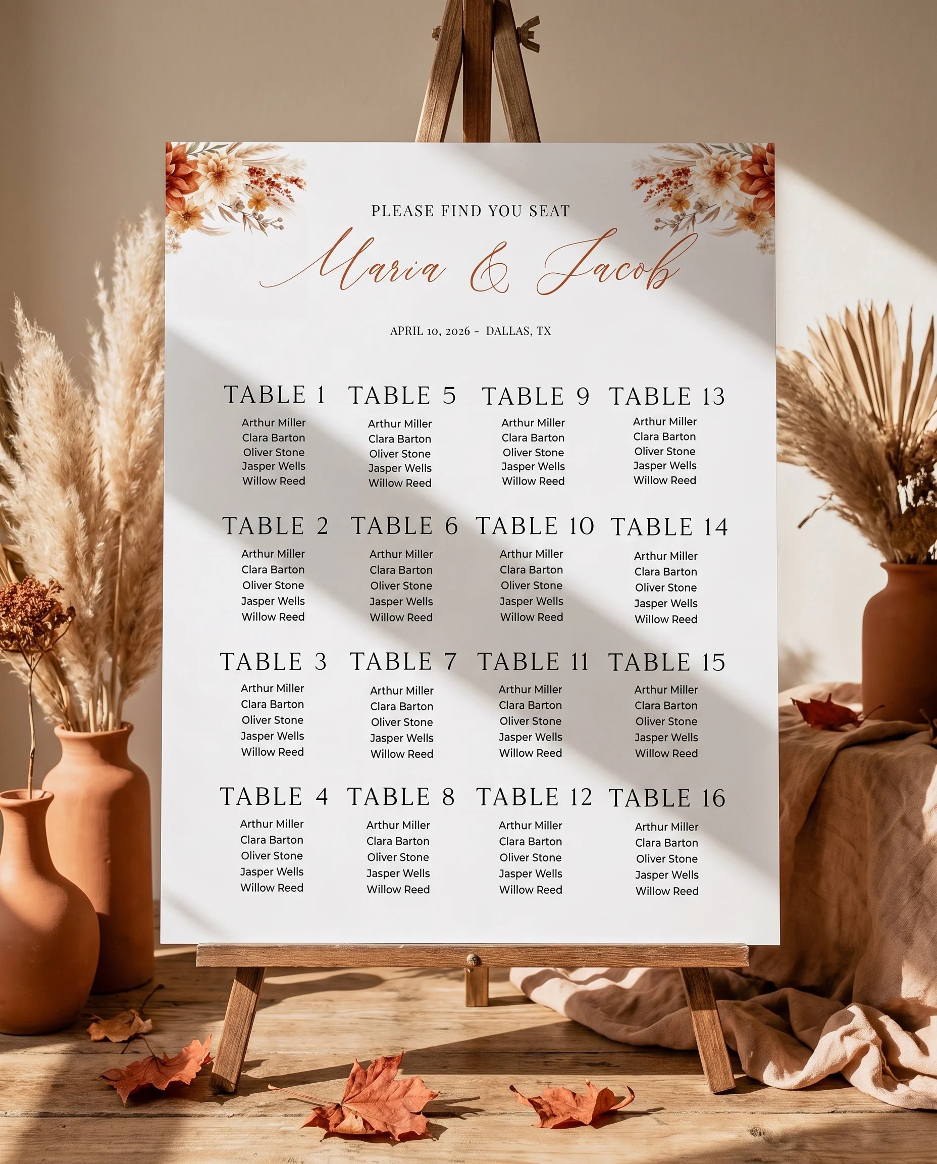 Dahlia Ember wedding seating chart — displayed on an easel under soft natural light at a slight overhead angle, wedding seating chart.