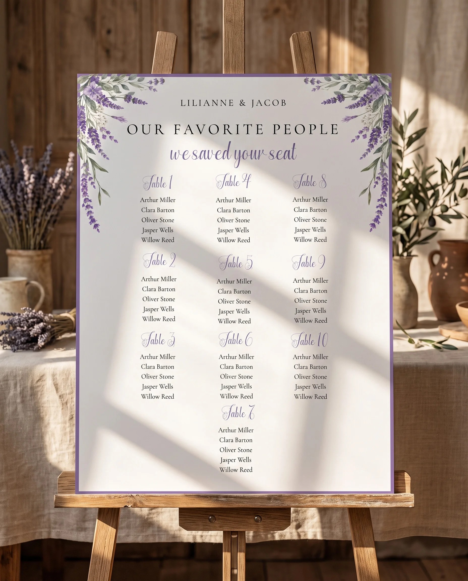 Provence Fields wedding seating chart — displayed on an easel under soft natural light with a slight overhead angle, wedding seating chart.