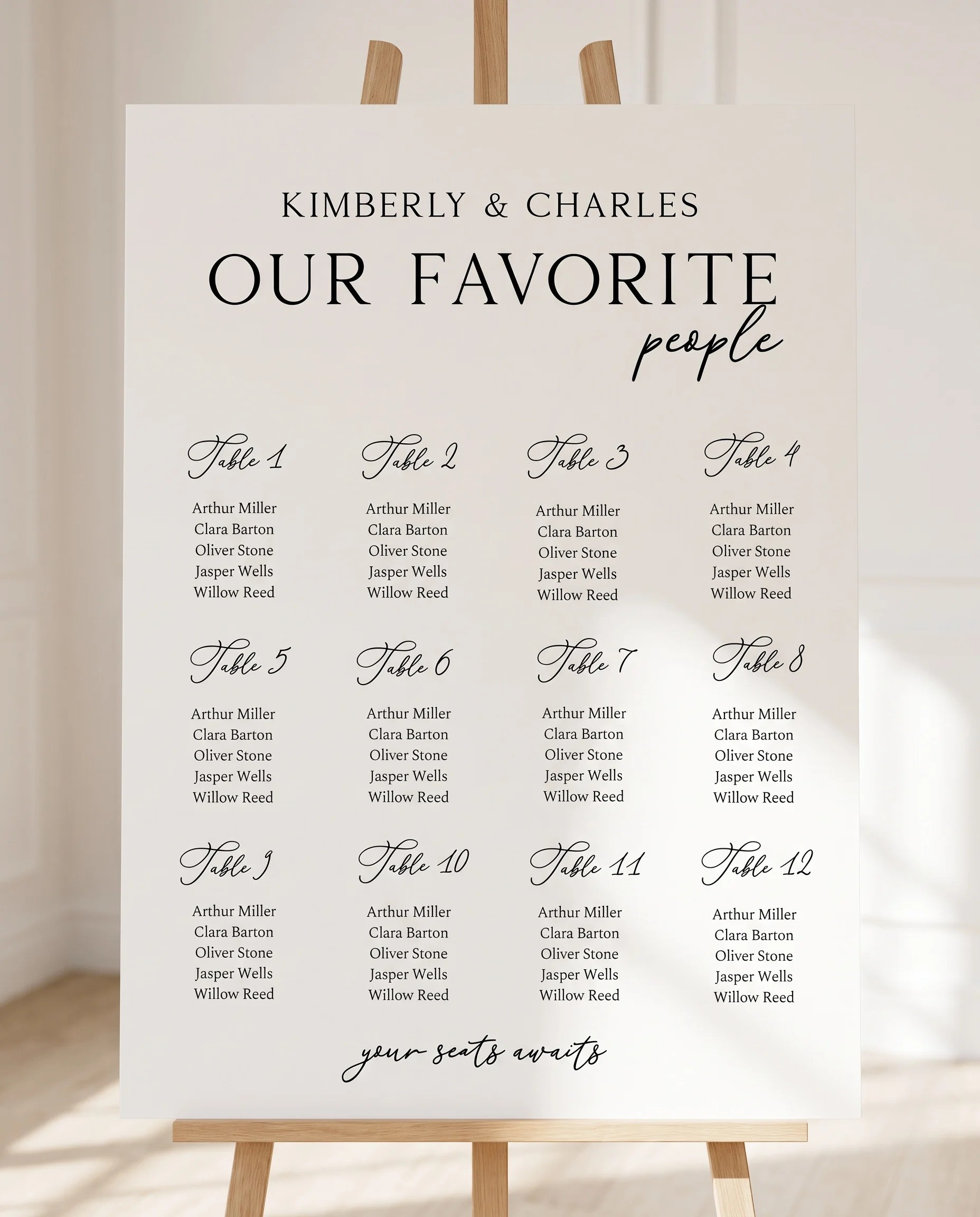Quiet Line wedding seating chart — displayed on an easel under soft natural light with a slight overhead angle, wedding seating chart.
