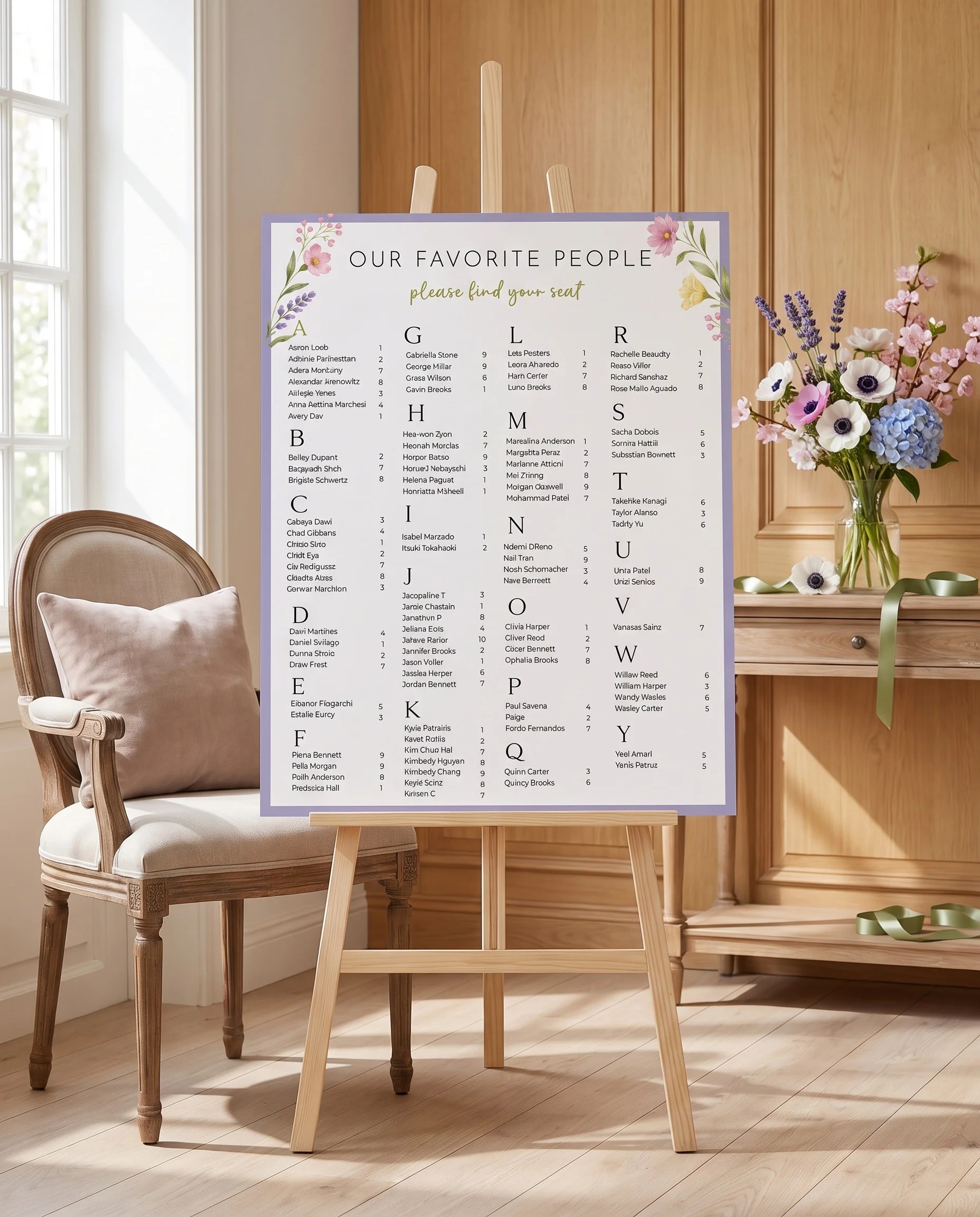 Anemone Toast wedding seating chart — single page shown beside furniture for scale under soft natural light, wedding seating chart template