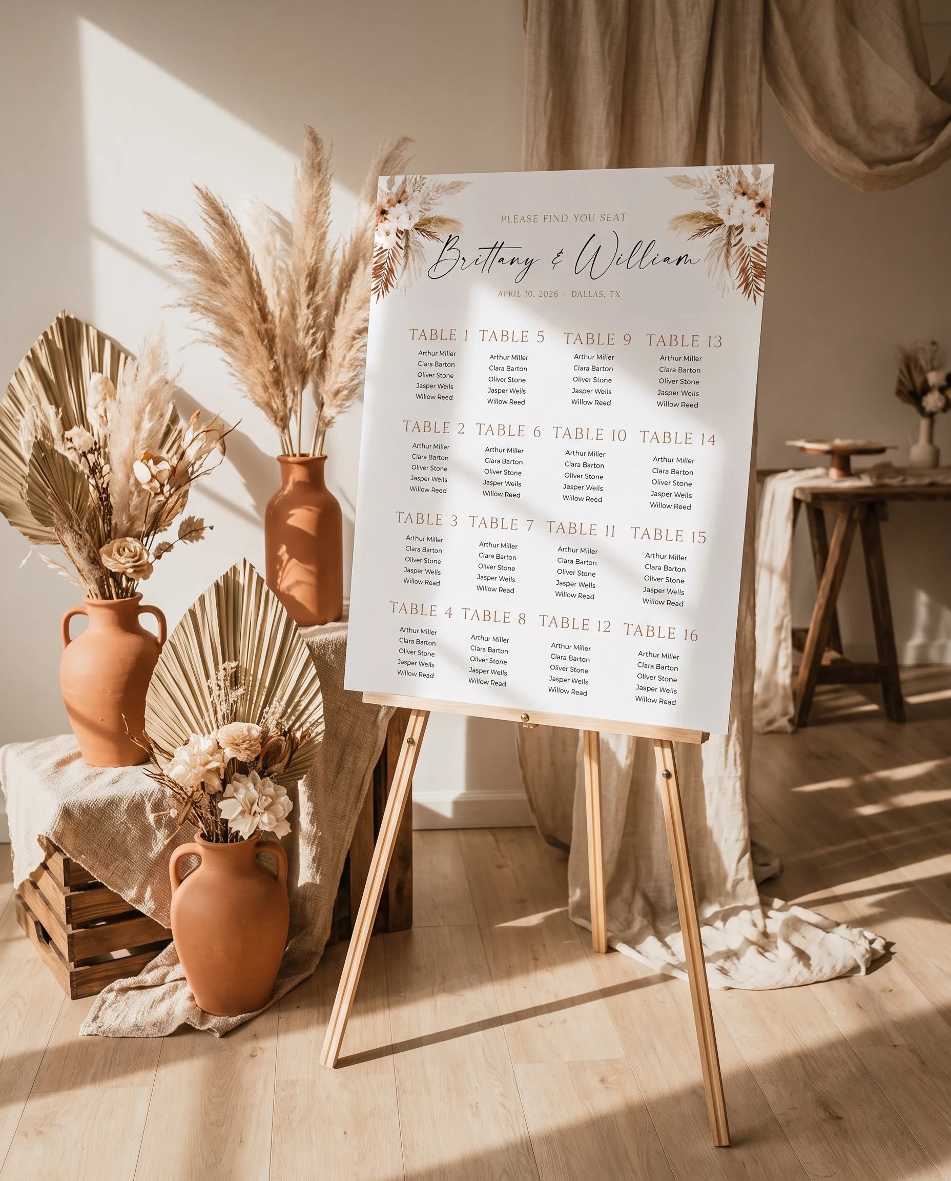 Pampas Bloom wedding seating chart — displayed at a reception entrance under soft natural light on premium editorial paper, seating chart template.
