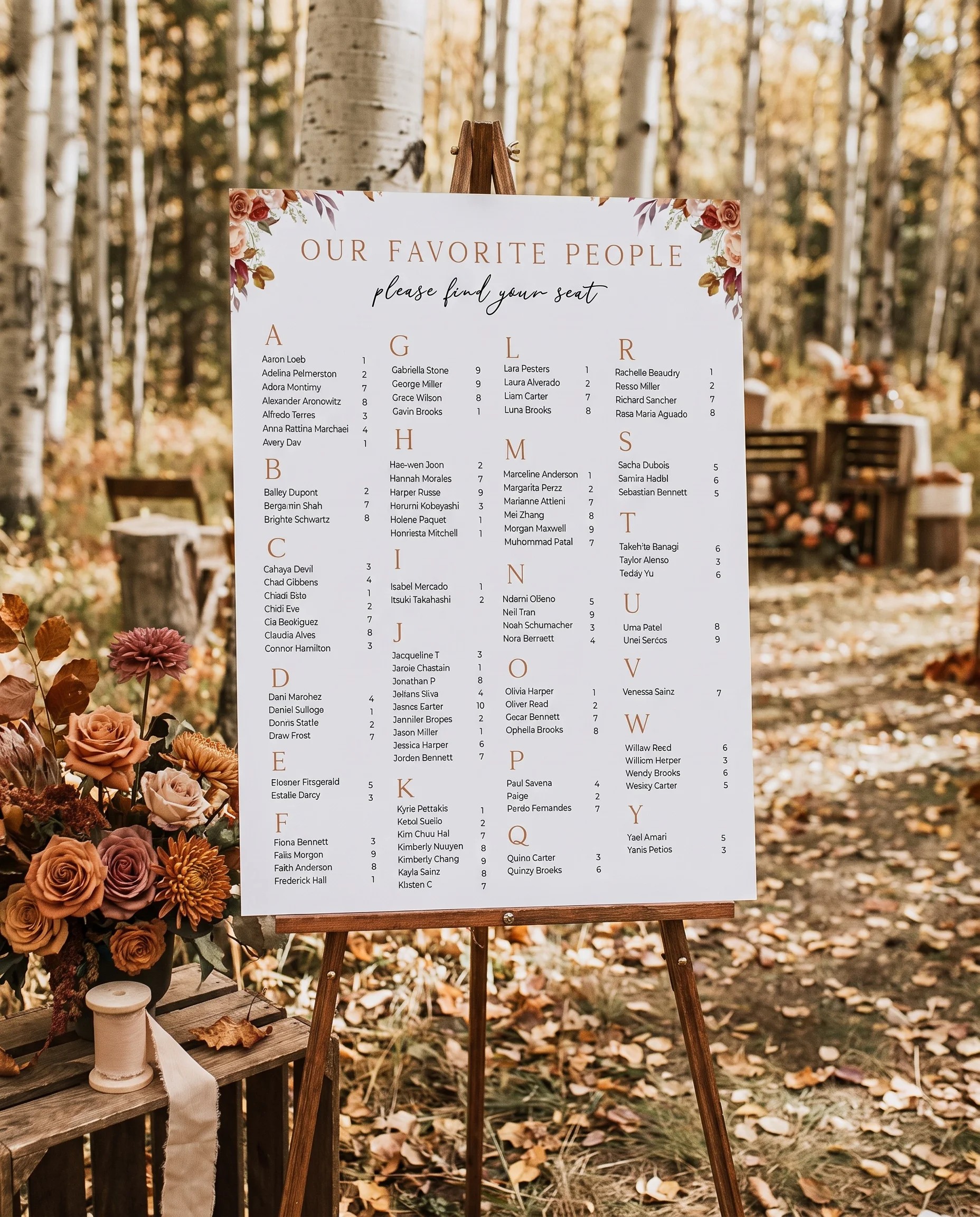 Autumn Bloom wedding seating chart — single page displayed at a reception entrance under soft natural light, seating chart template