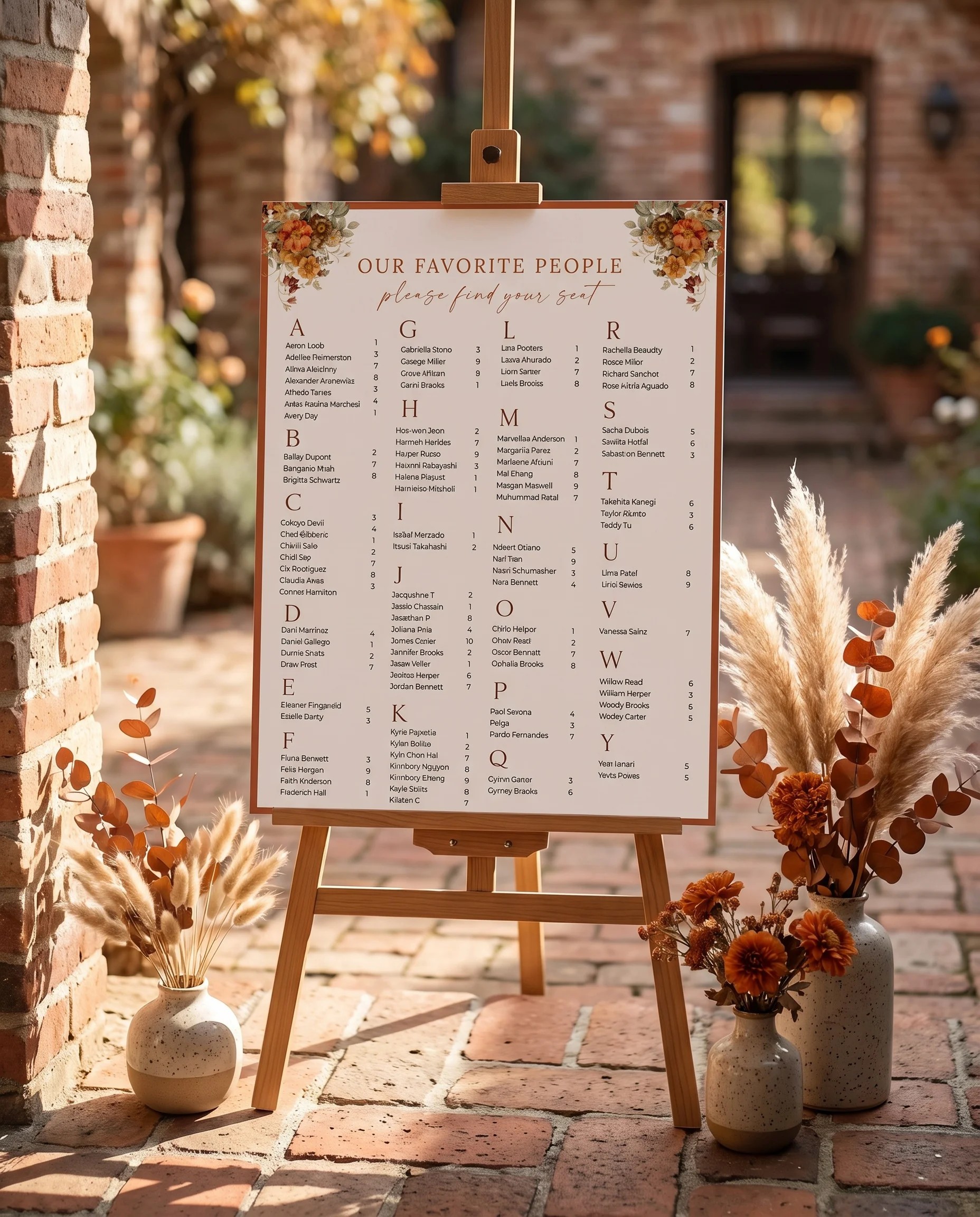 Terracotta Crown wedding seating chart — displayed at a reception entrance under soft natural light, seating chart template