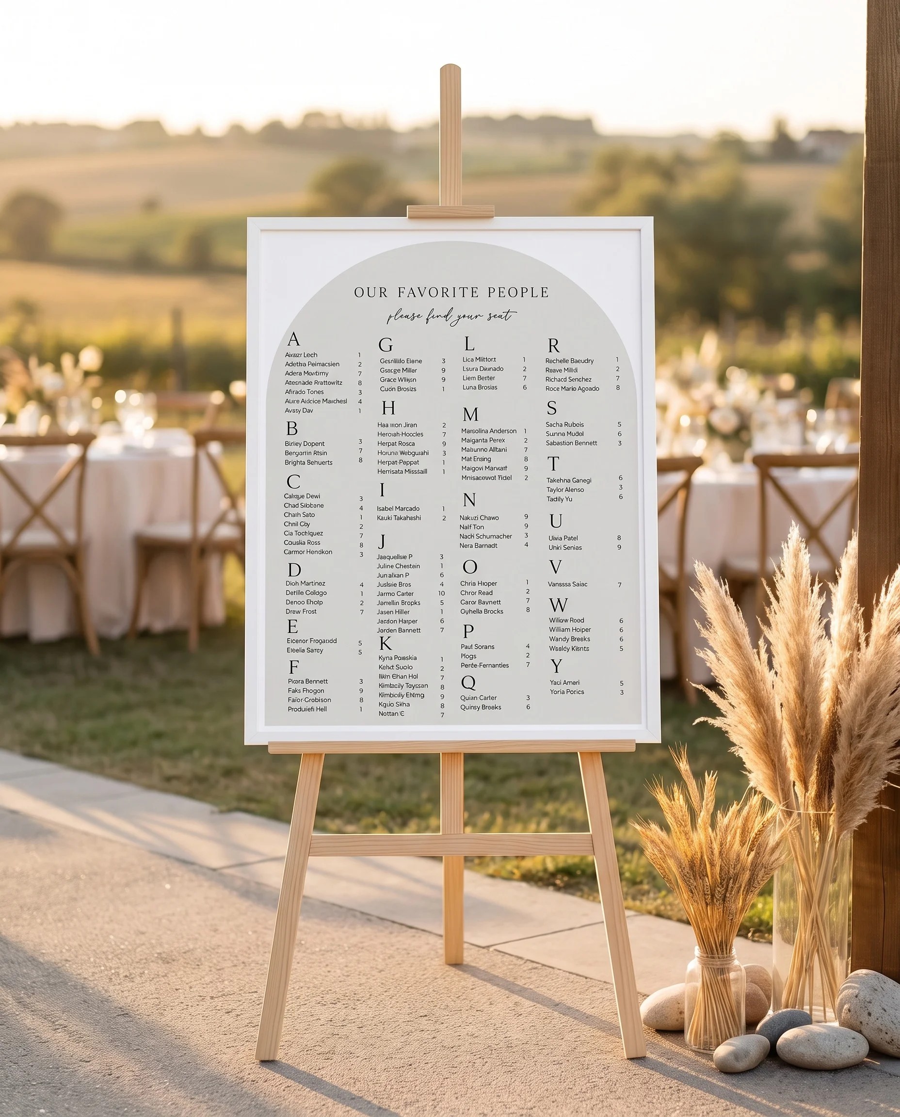 Halo Arch wedding seating chart — displayed at a reception entrance under soft natural light, seating chart template
