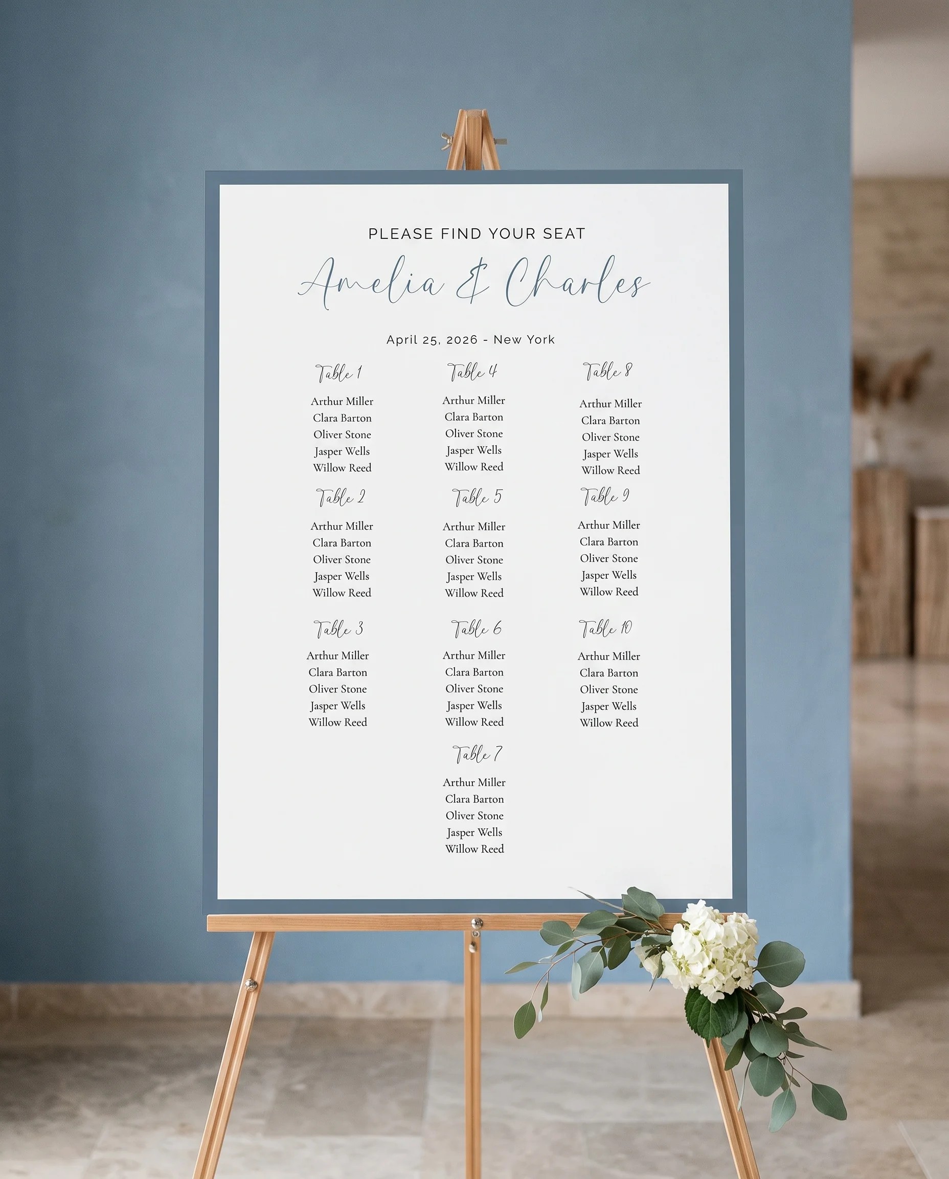 Arrow Crest wedding seating chart — displayed on an easel under soft natural light with a slight overhead angle, wedding seating chart.