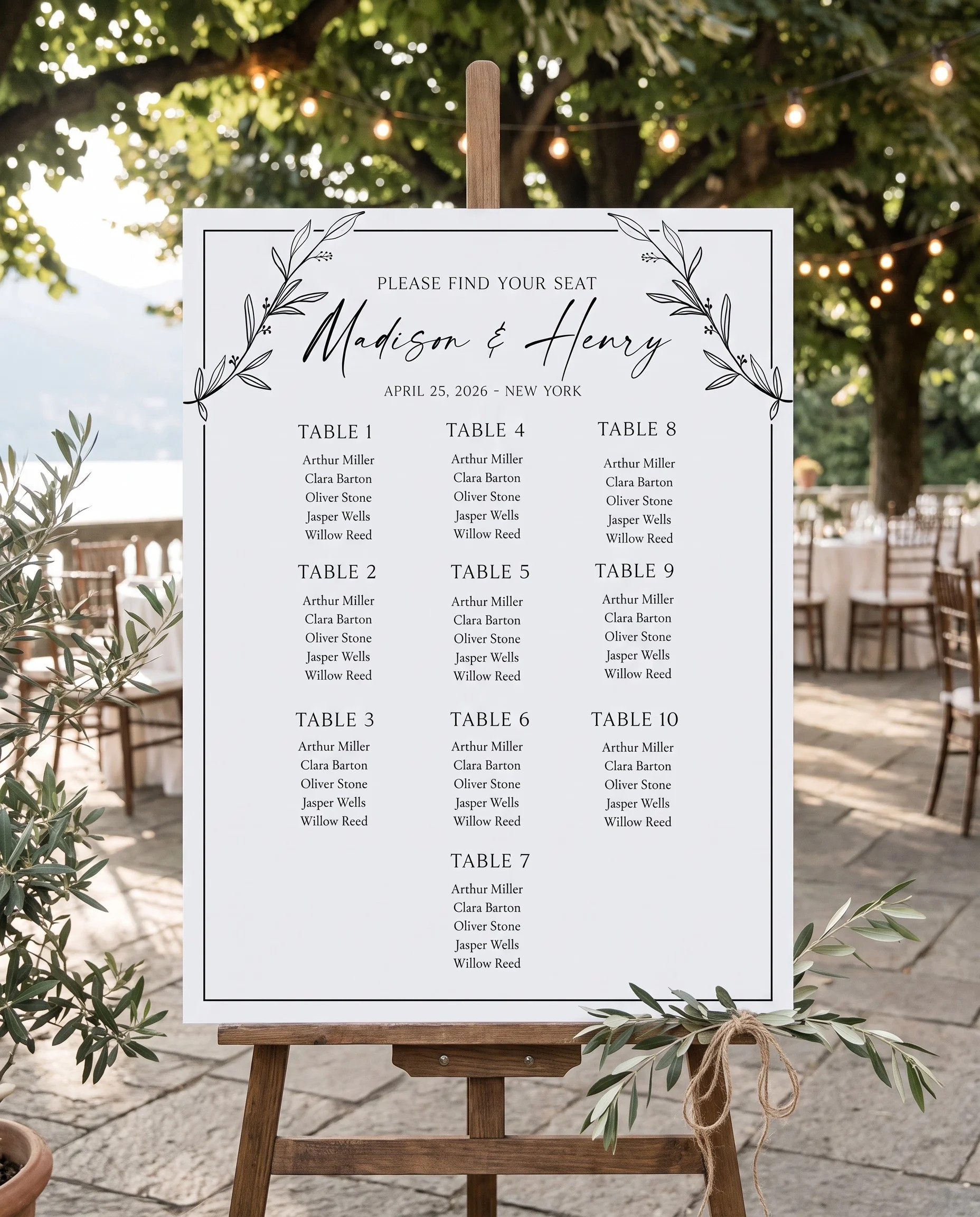 Willow Script wedding seating chart — displayed on an easel under soft natural light with a slight overhead angle, wedding seating chart