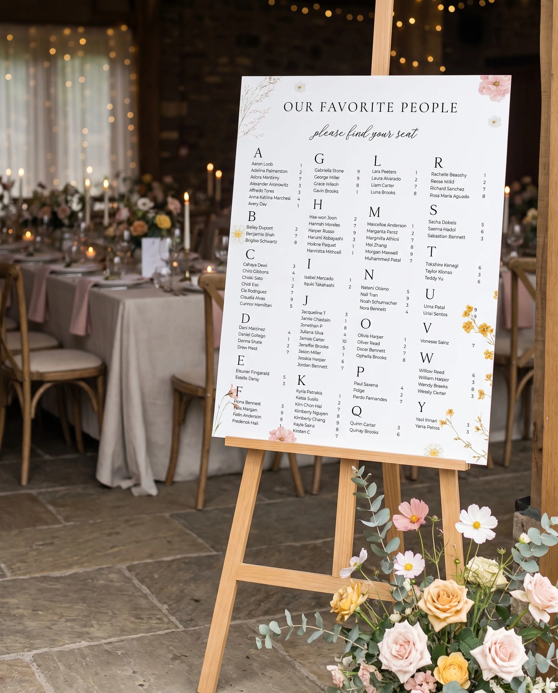 Marigold Petal wedding seating chart — single page displayed at a reception entrance under soft natural light, seating chart template