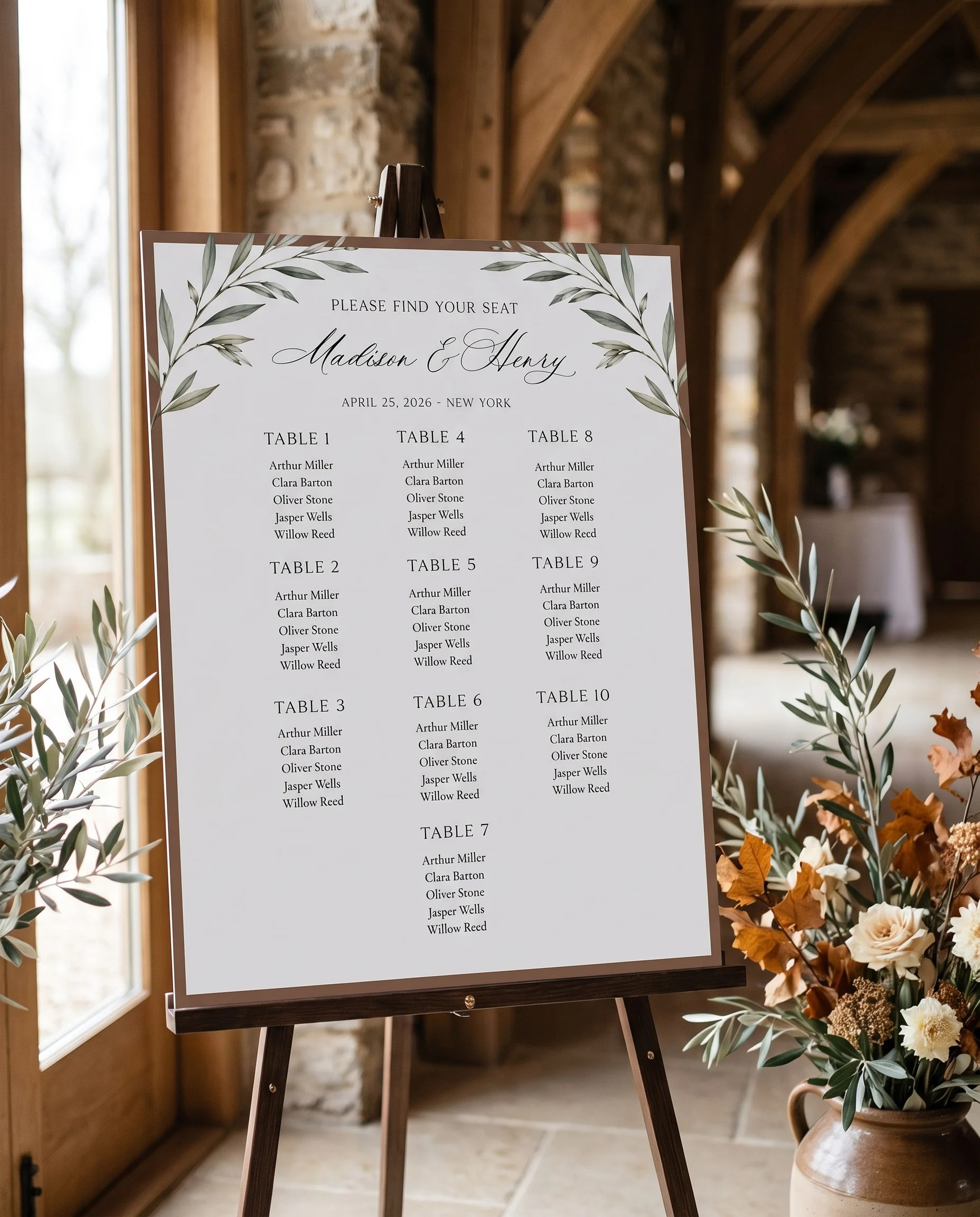 Olive Arc wedding seating chart — displayed at a reception entrance under soft natural light, seating chart template