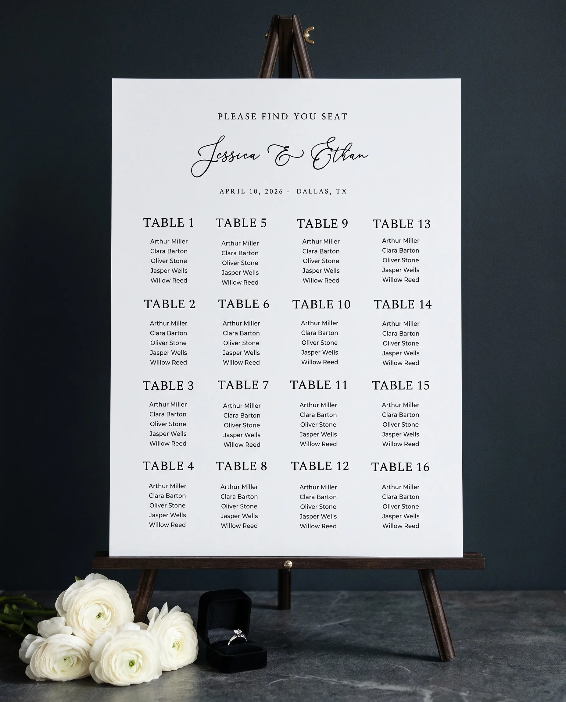 Monochrome Veil wedding seating chart — single page displayed on an easel under soft natural light, wedding seating chart
