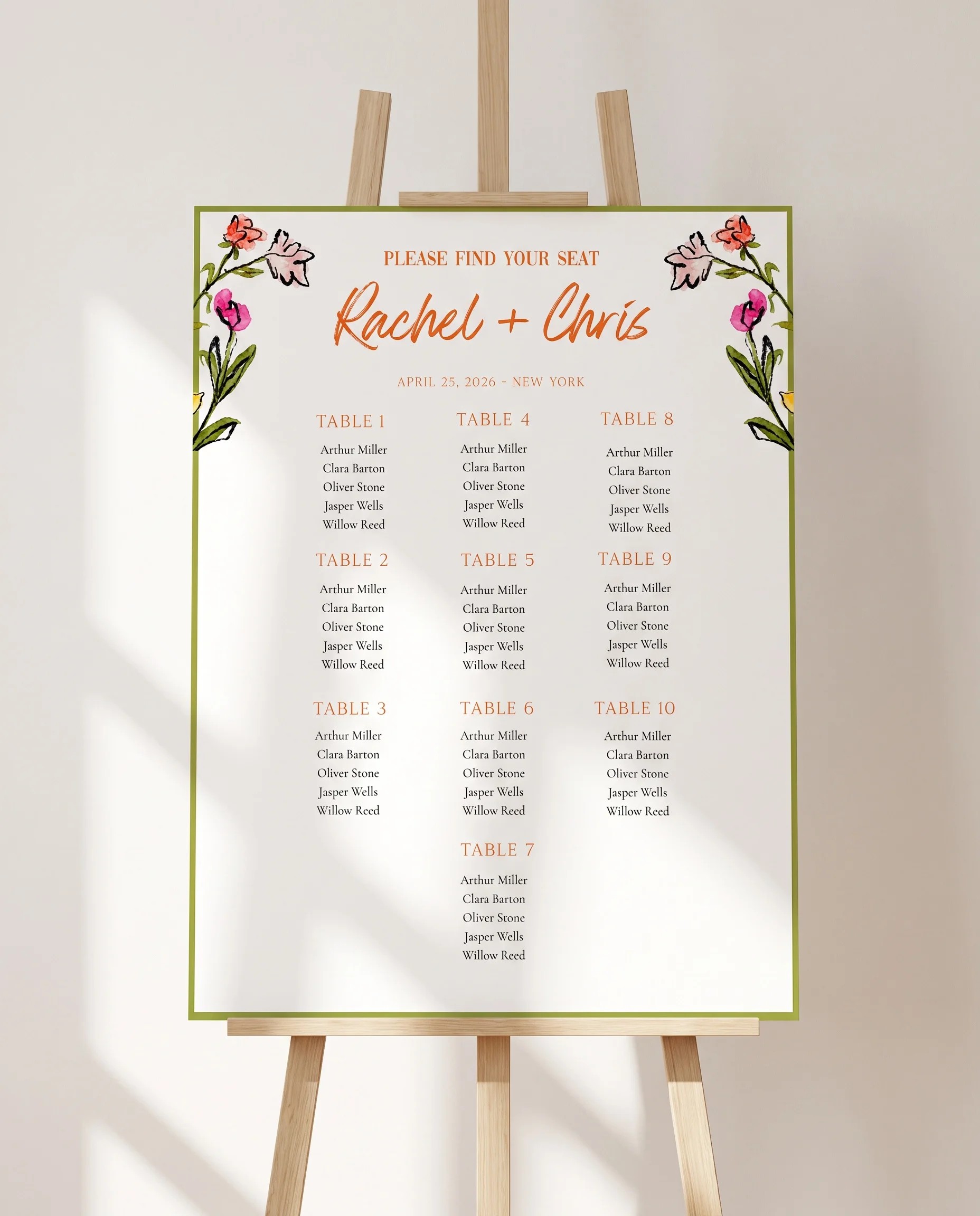Poppy Court wedding seating chart — displayed on an easel under soft natural light with a slight overhead angle, wedding seating chart.