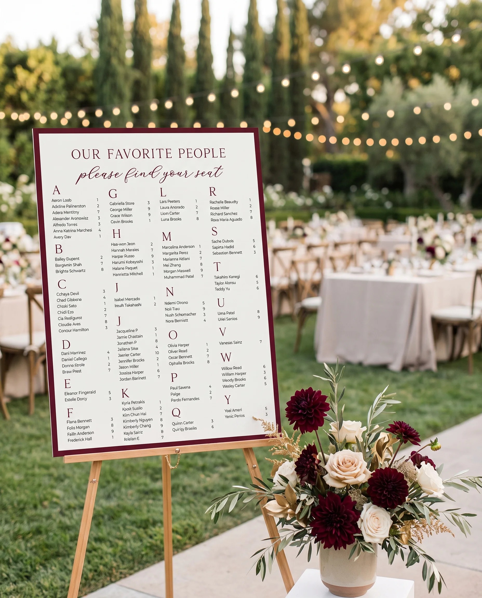 Claret Vine wedding seating chart — displayed at a reception entrance under soft natural light, seating chart template