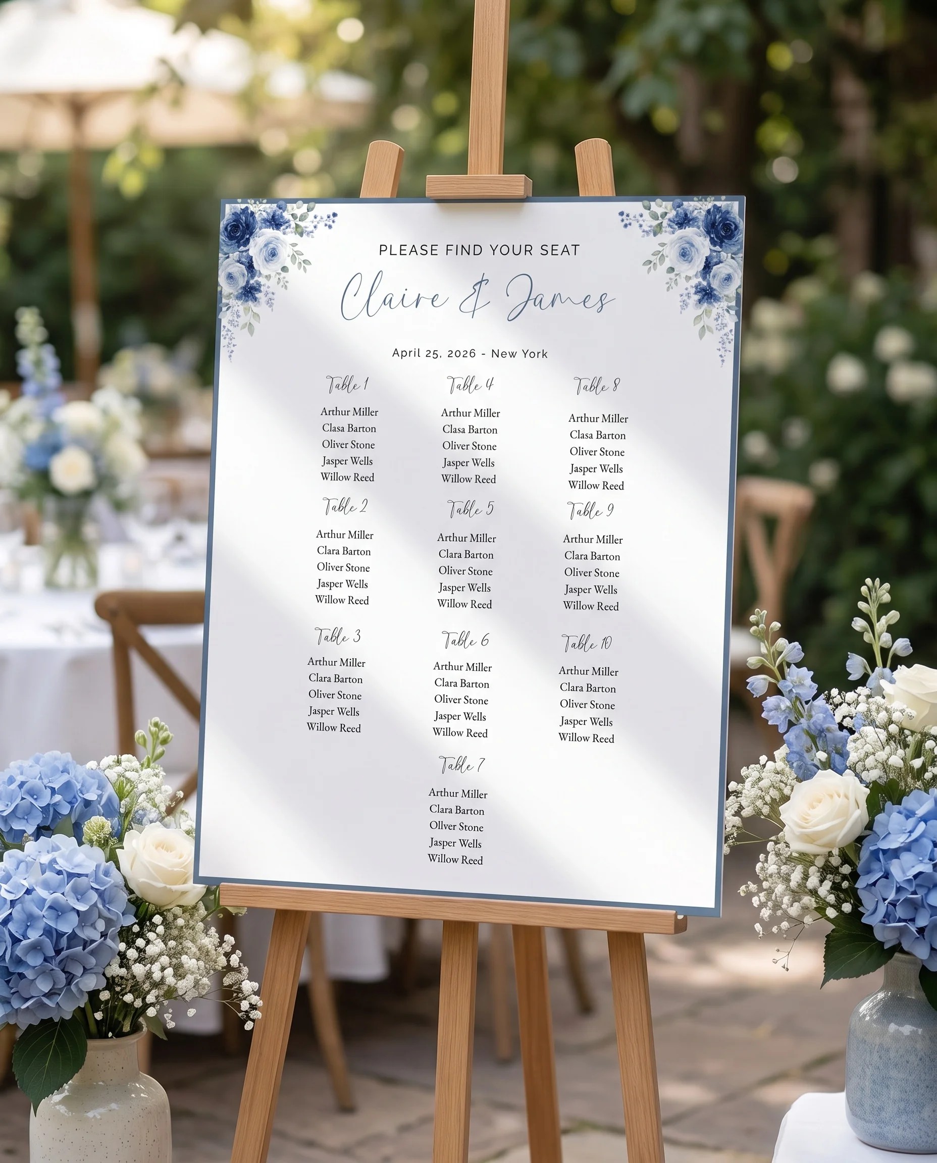 Bluebloom wedding seating chart — single page displayed at a reception entrance under soft natural light, seating chart template