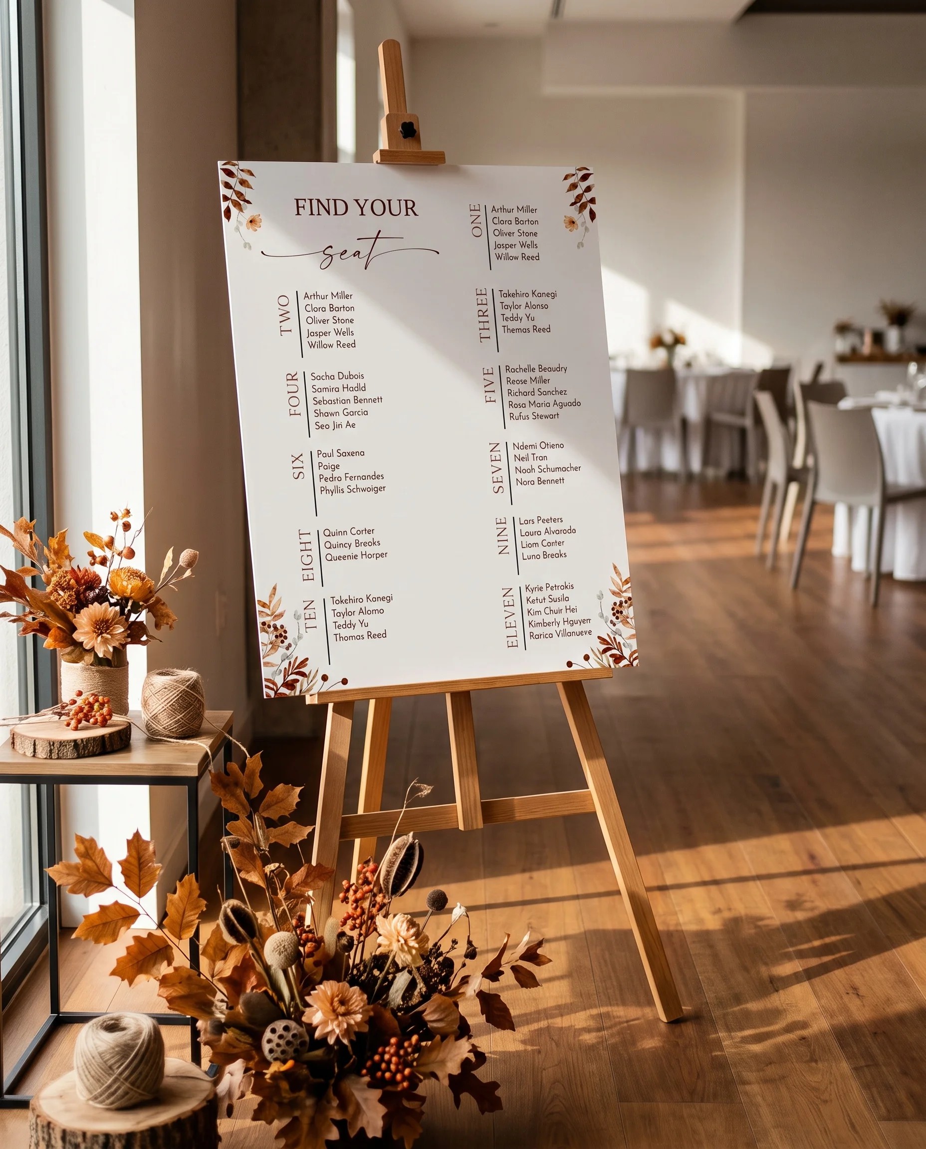 Autumn Bower wedding seating chart — single page displayed at a reception entrance under soft natural light, seating chart template