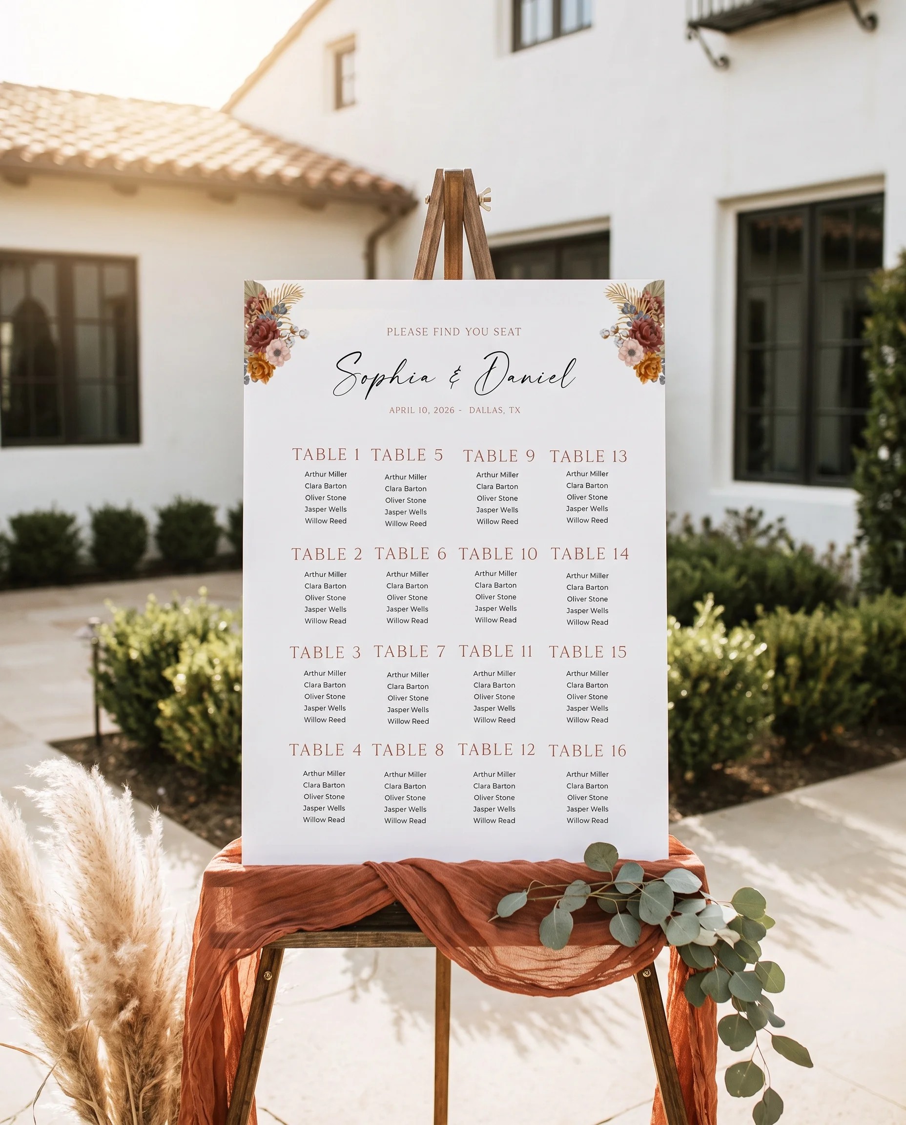 Marisol Bloom wedding seating chart — displayed on an easel under soft natural light with a slight overhead angle, wedding seating chart
