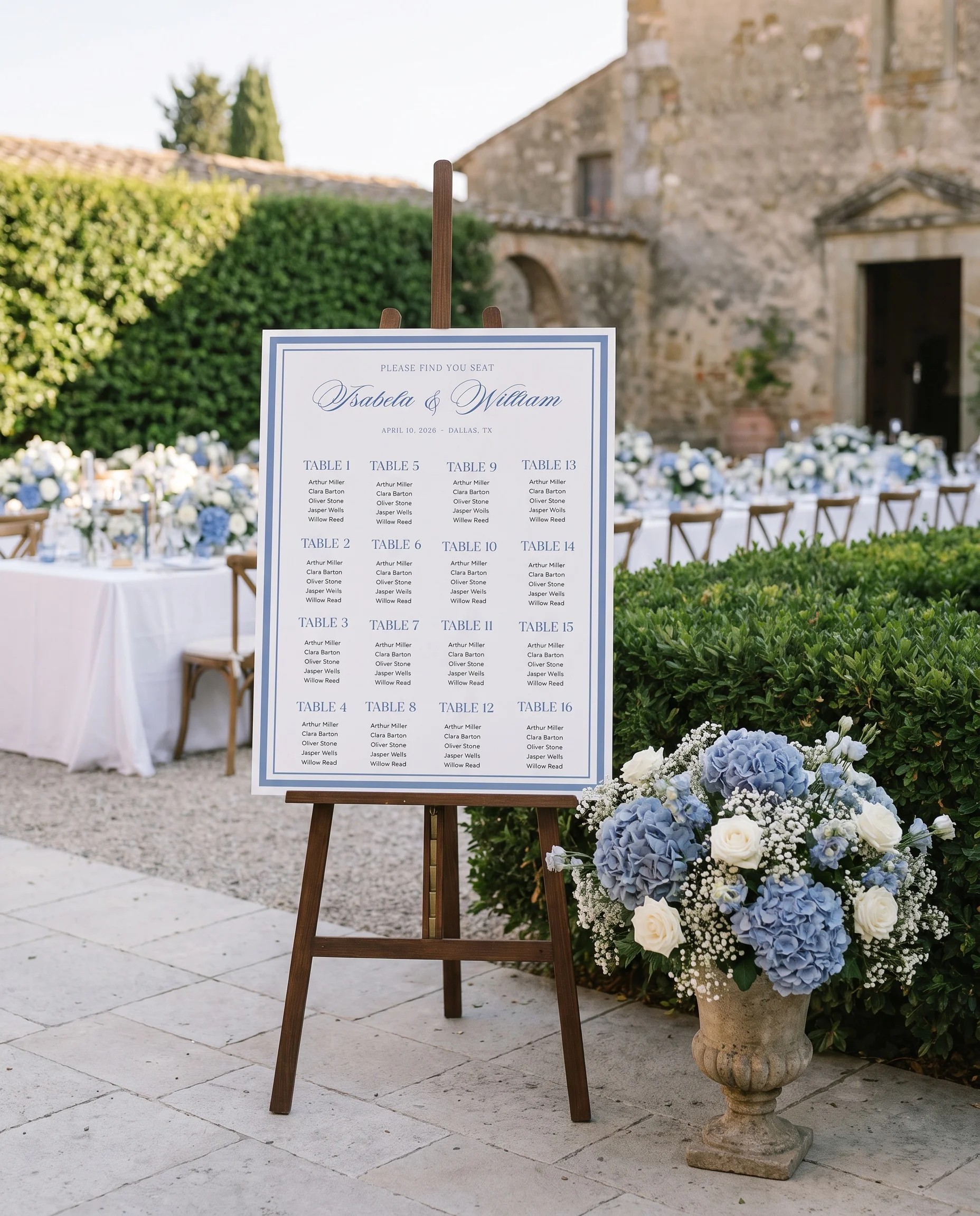 Azure Flourish wedding seating chart — displayed at a reception entrance under soft natural light with a slight overhead angle, seating chart template