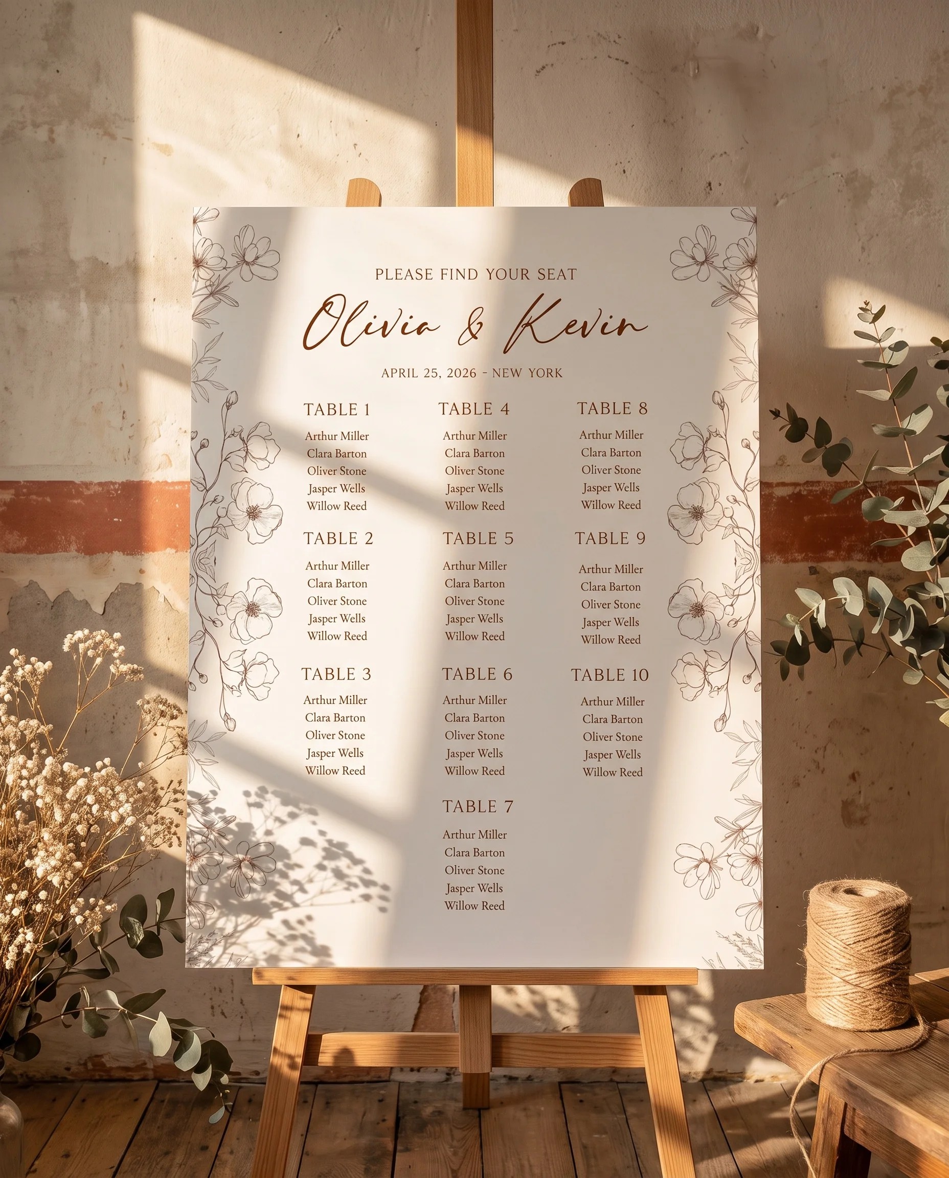 Arrow Bloom wedding seating chart — single page displayed on an easel under soft natural light, wedding seating chart.