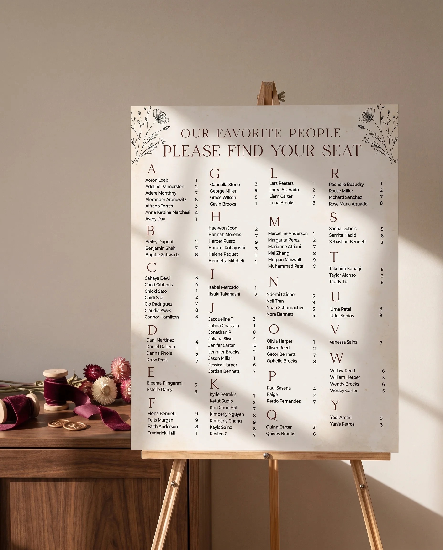 Heritage Bloom wedding seating chart — shown beside furniture for scale under soft natural light, premium editorial paper, wedding seating chart template.