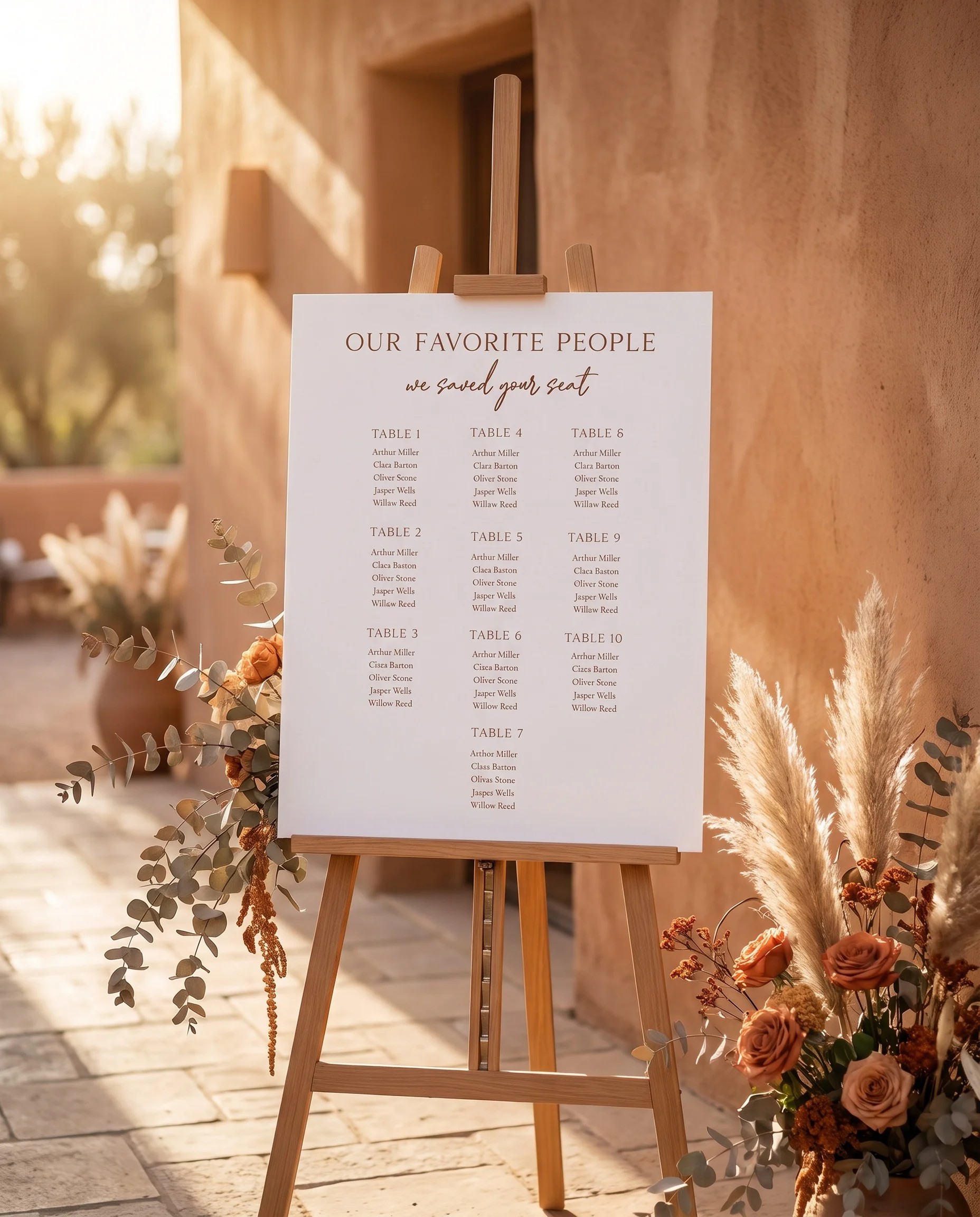 Briar Script wedding seating chart — displayed at a reception entrance under soft natural light, seating chart template