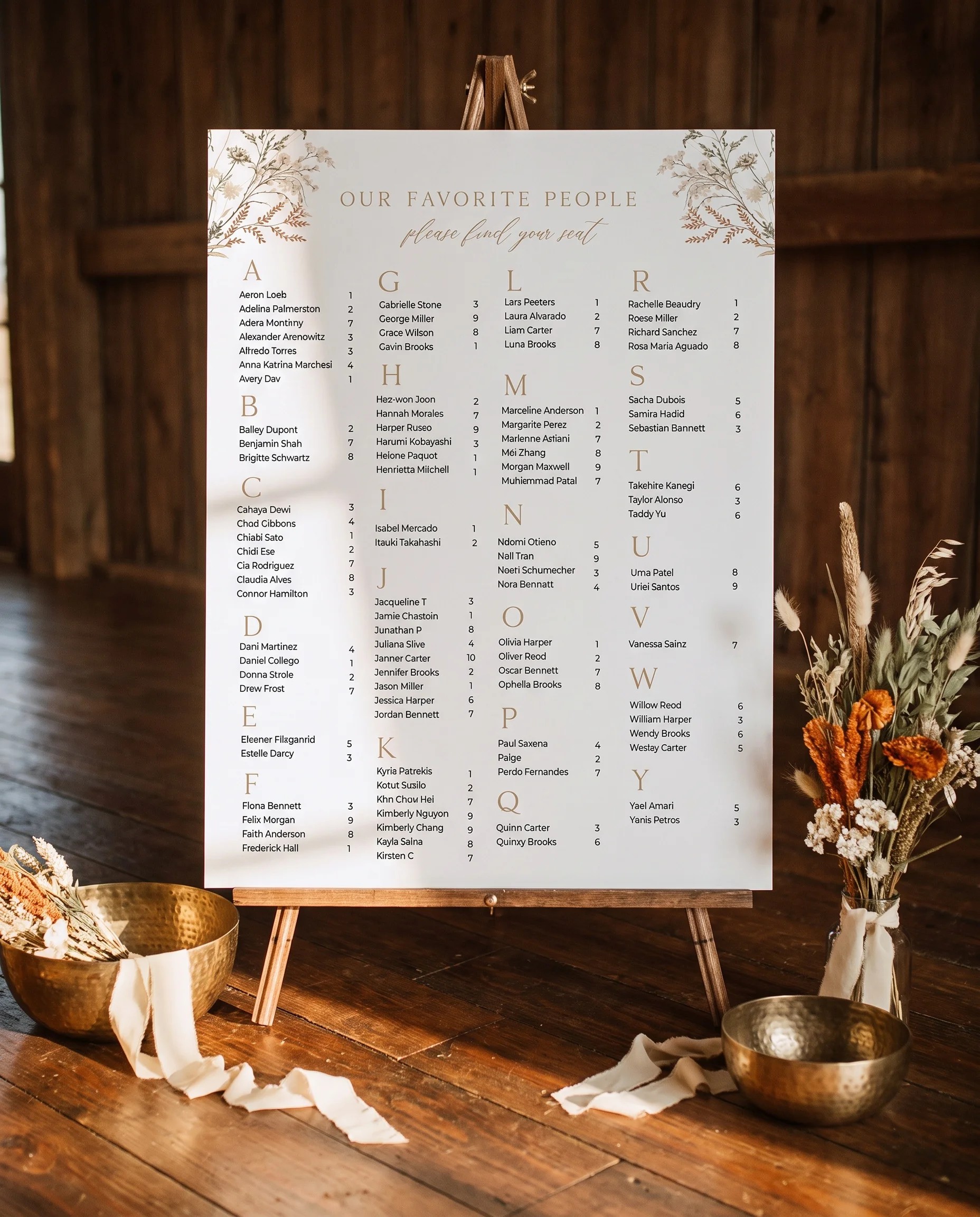 Bramble Court wedding seating chart — displayed on an easel under soft natural light with a slight overhead angle, wedding seating chart