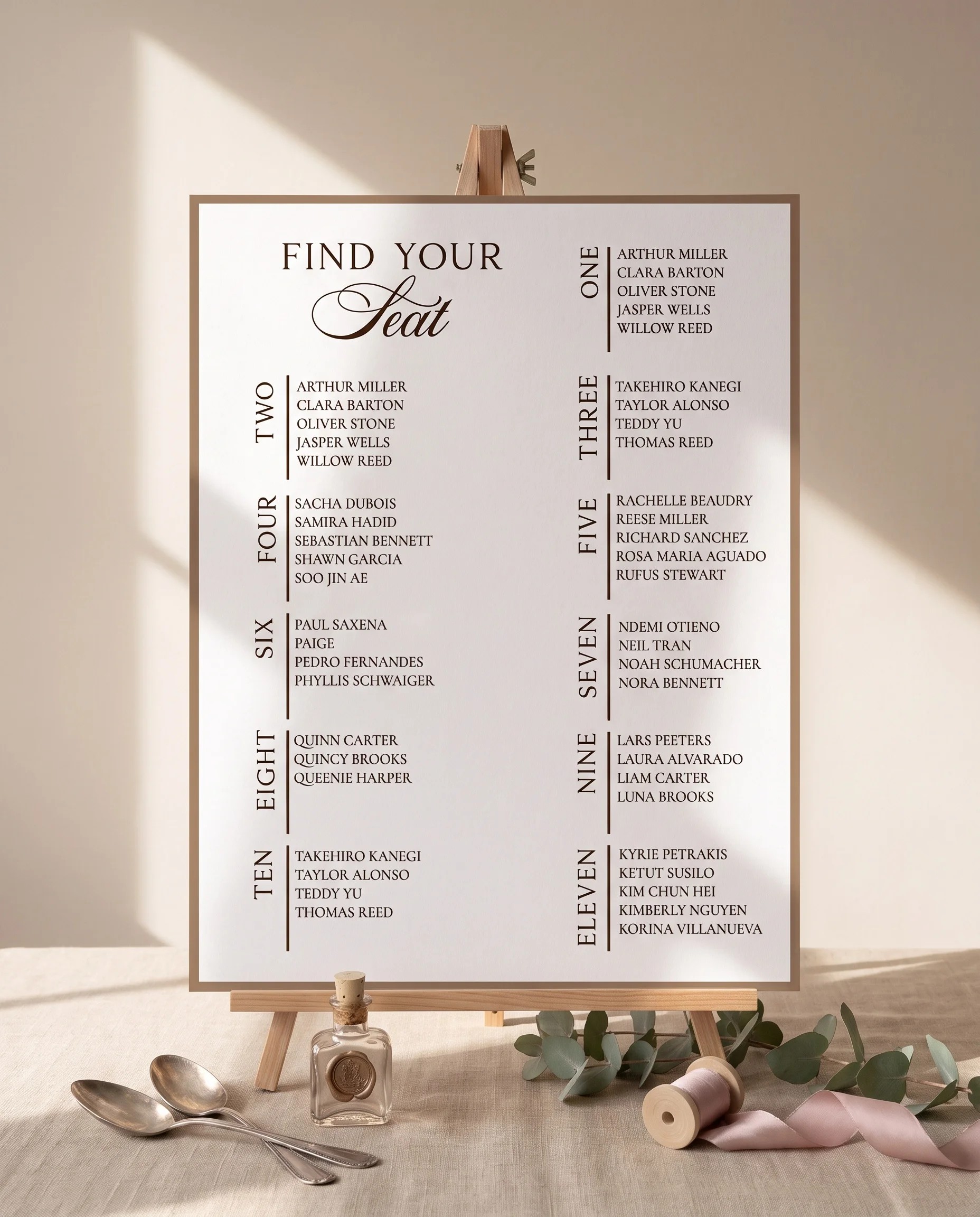 Hinge Script wedding seating chart — displayed on an easel under soft natural light, slight overhead angle, wedding seating chart.