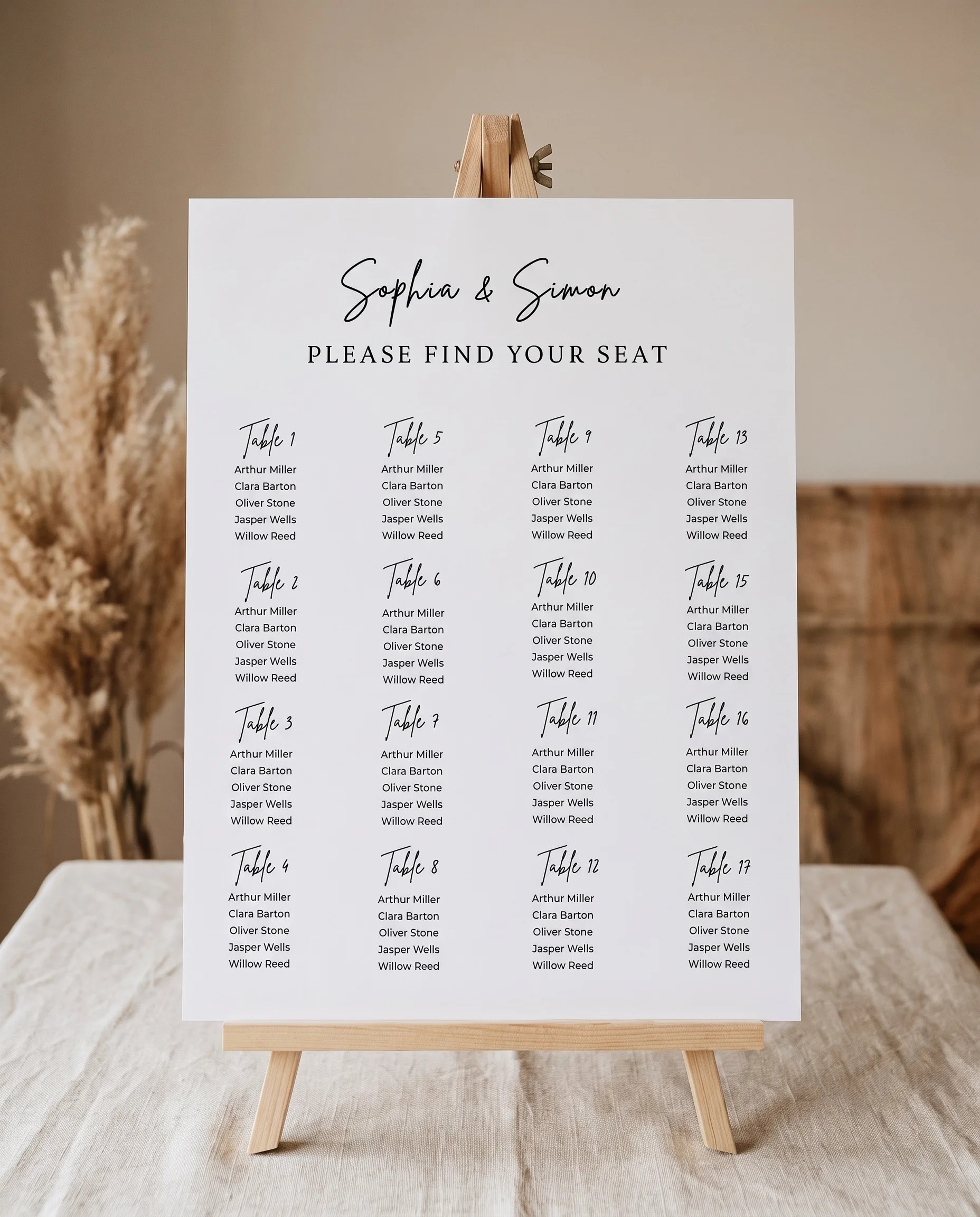 Arrowcrest wedding seating chart — single page displayed on an easel under soft natural light, wedding seating chart.