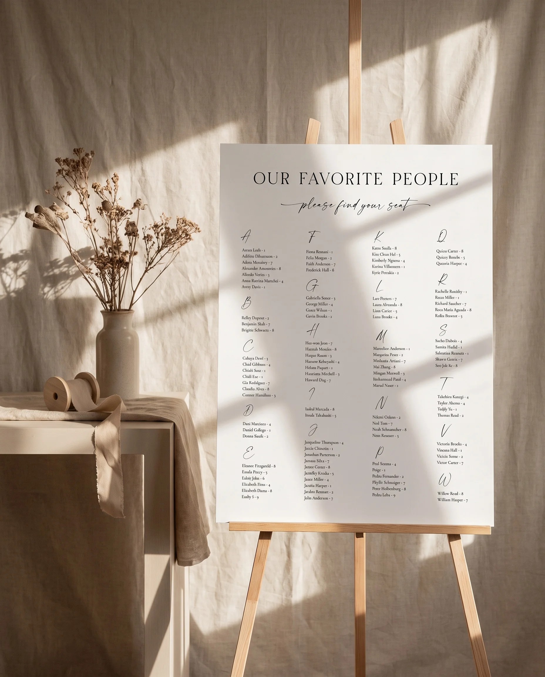 Charline wedding seating chart — single page shown beside furniture for scale under soft natural light, wedding seating chart template