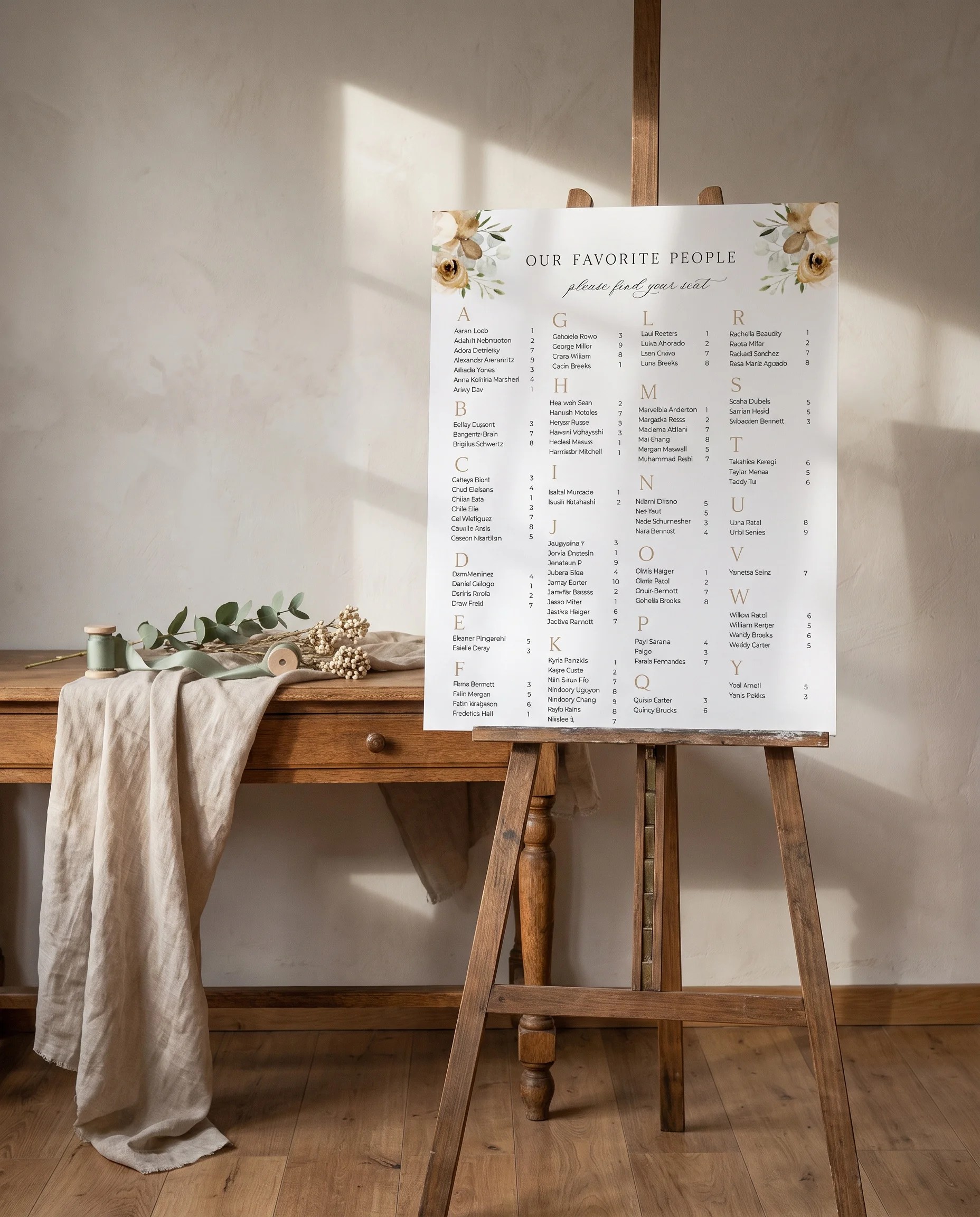 Meadow Veil wedding seating chart — single page shown beside furniture for scale under soft natural light, wedding seating chart template