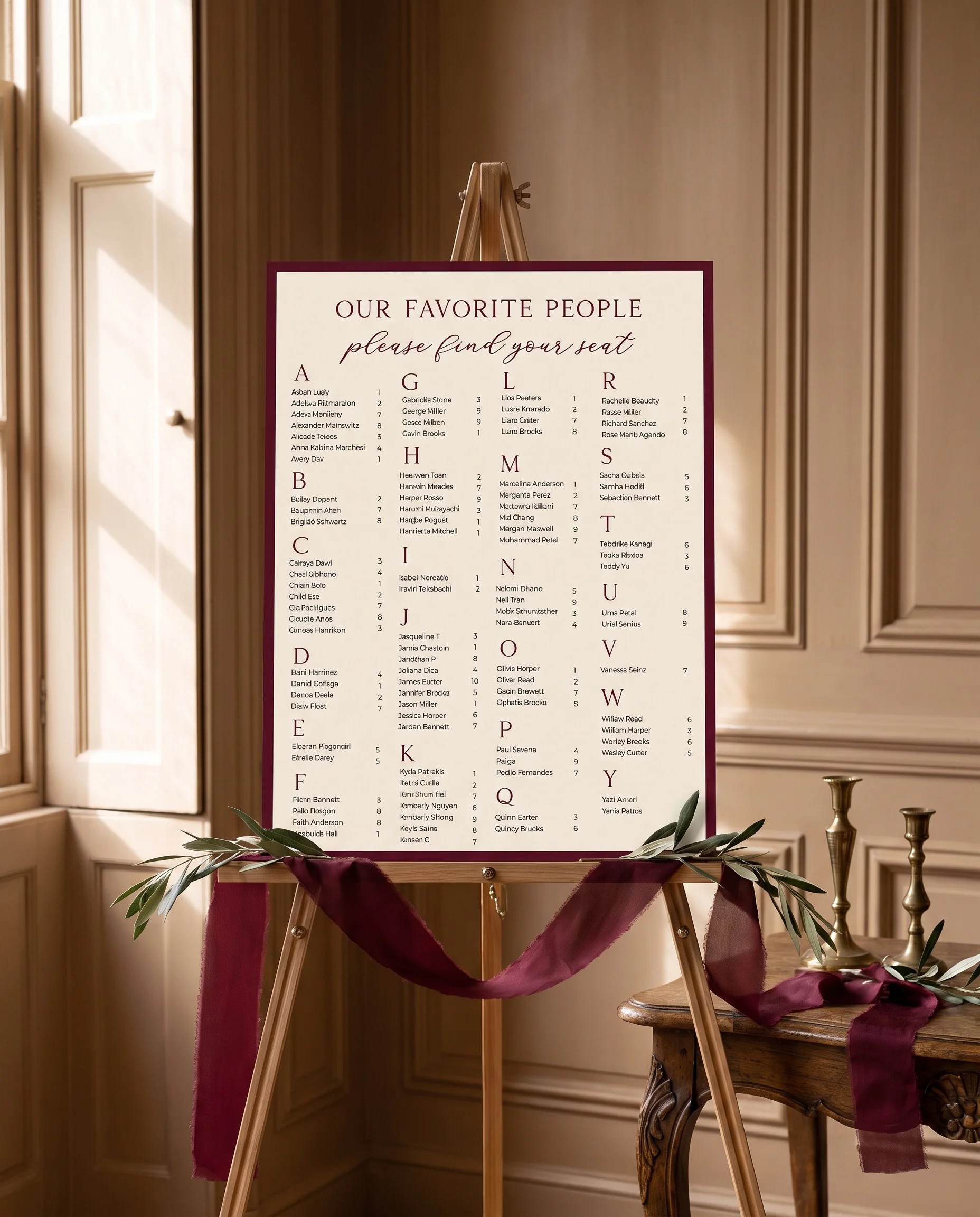Claret Vine wedding seating chart — displayed on an easel under soft natural light with a slight overhead angle, wedding seating chart