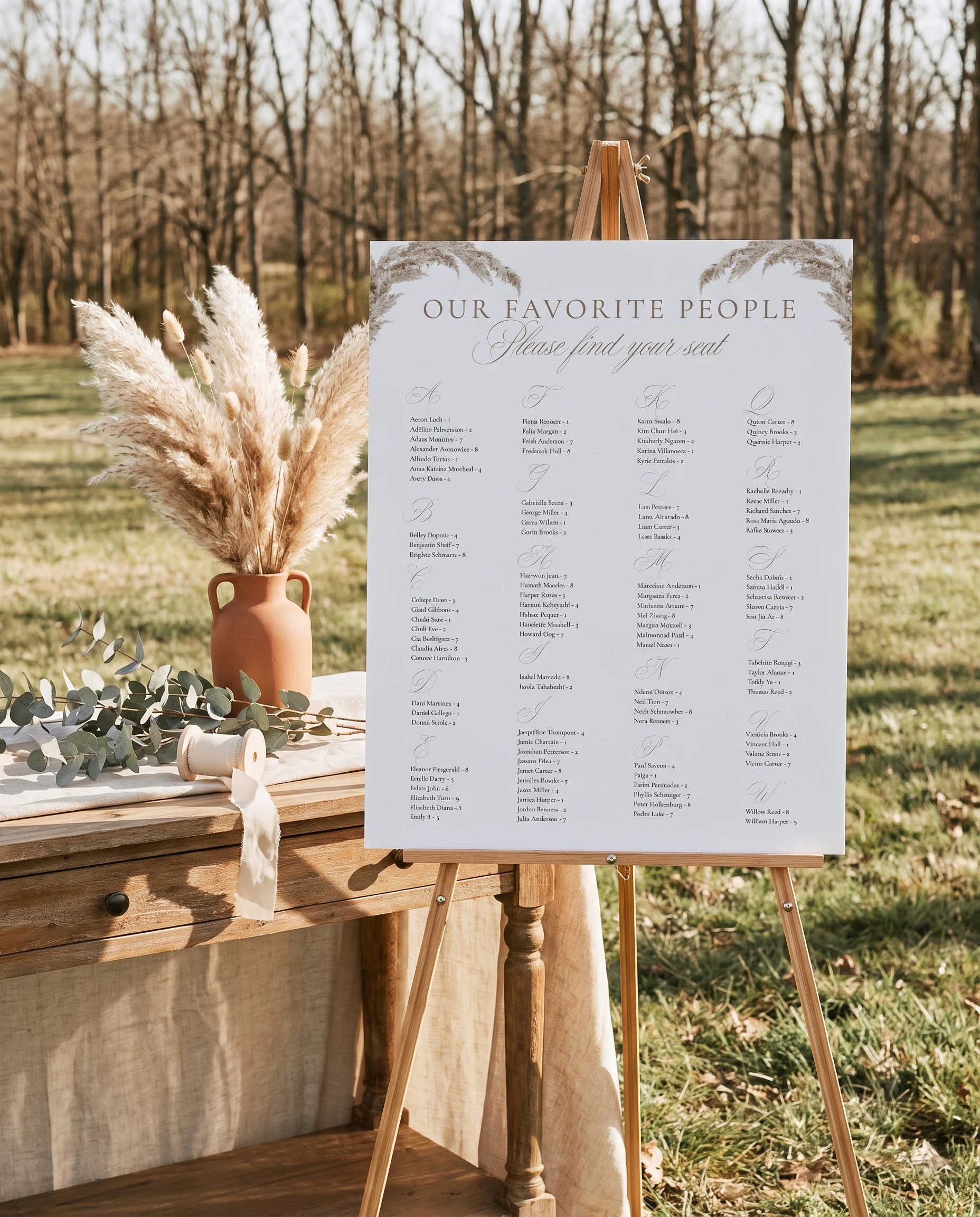 Pampas wedding seating chart — shown beside furniture for scale under soft natural light with a slight overhead angle, wedding seating chart template