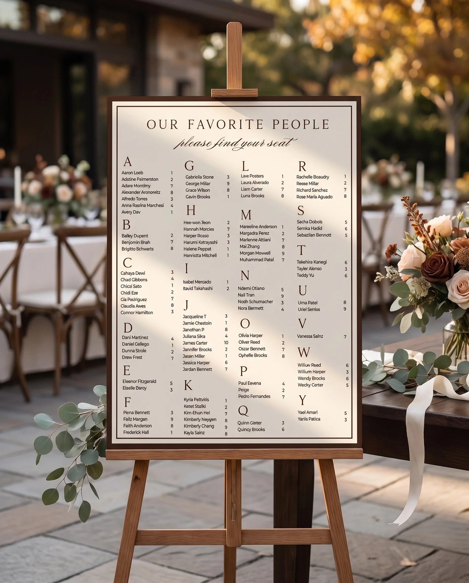 Velour wedding seating chart — displayed at a reception entrance under soft natural light, seating chart template