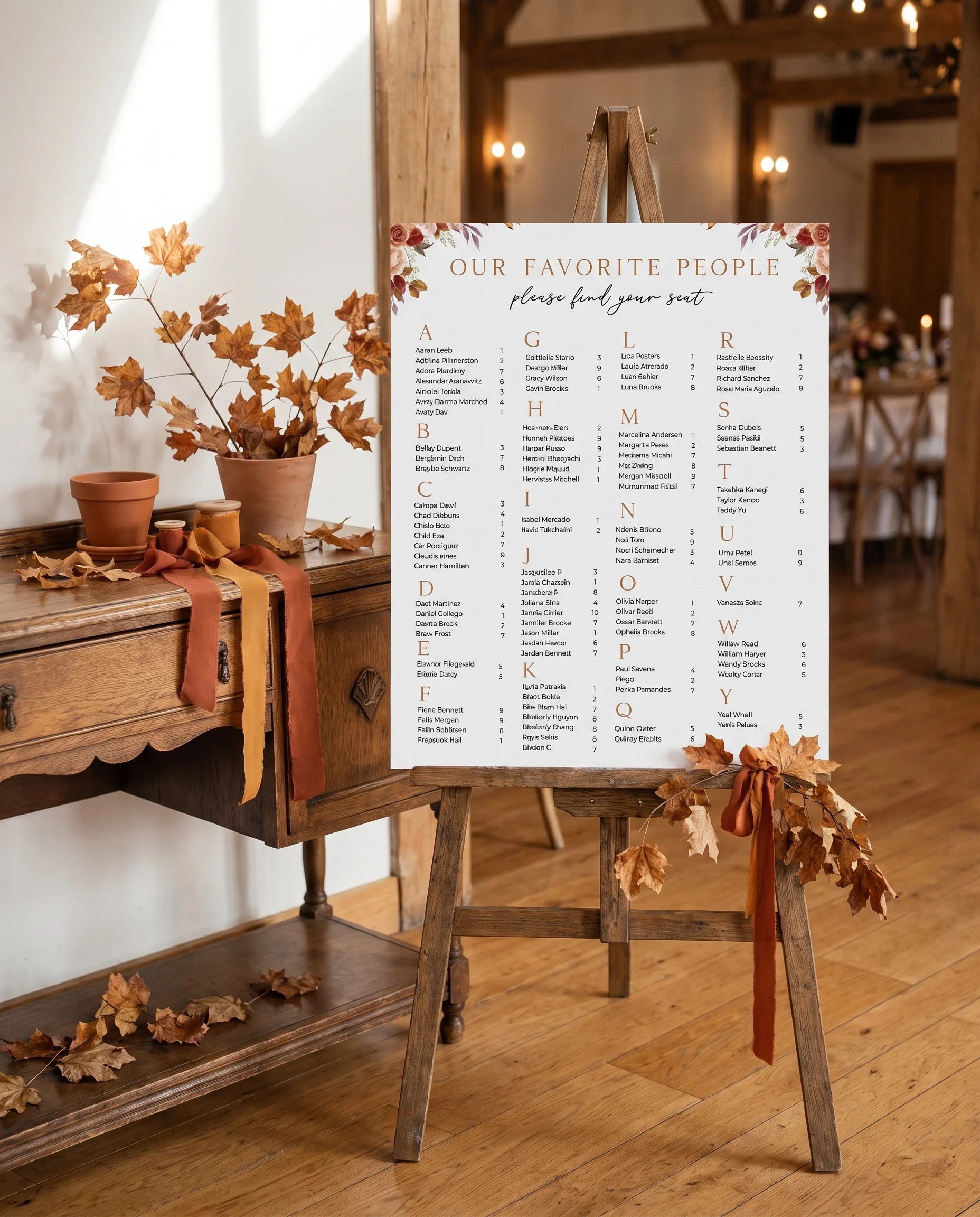 Autumn Bloom wedding seating chart — single page shown beside furniture for scale under soft natural light, wedding seating chart template